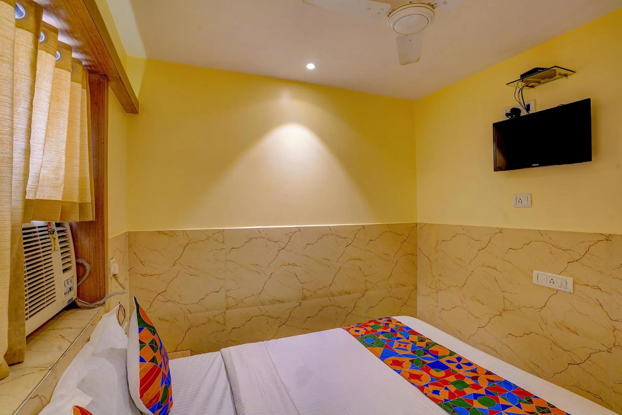 Bed in FabHotel Starwood Residency - 100M From Dr DY Patil Stadium