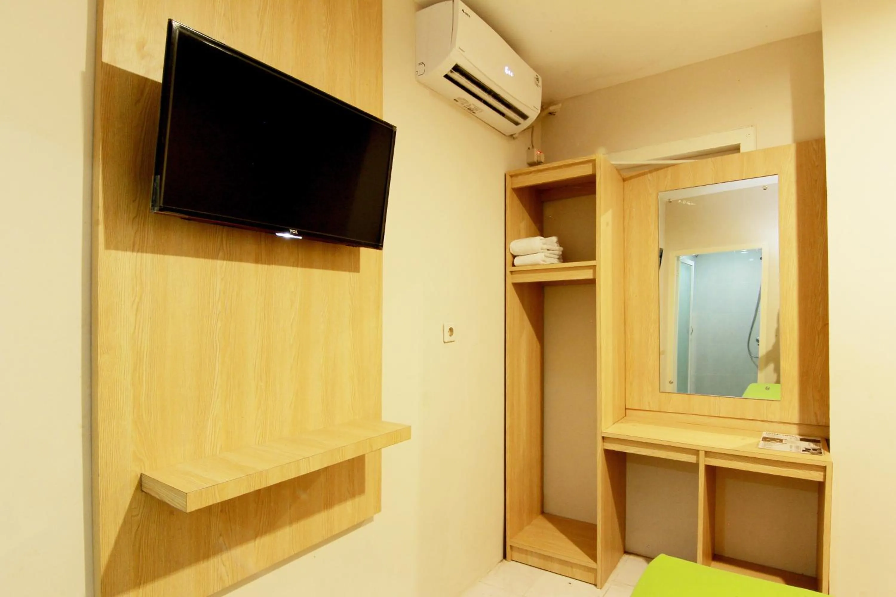 TV and multimedia in Homestay HD Inn