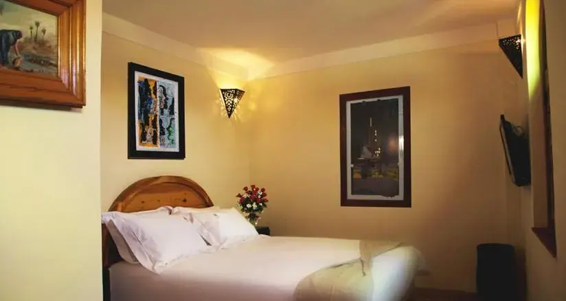 Bed in Riad Granvilier Bed in Riad Granvilier