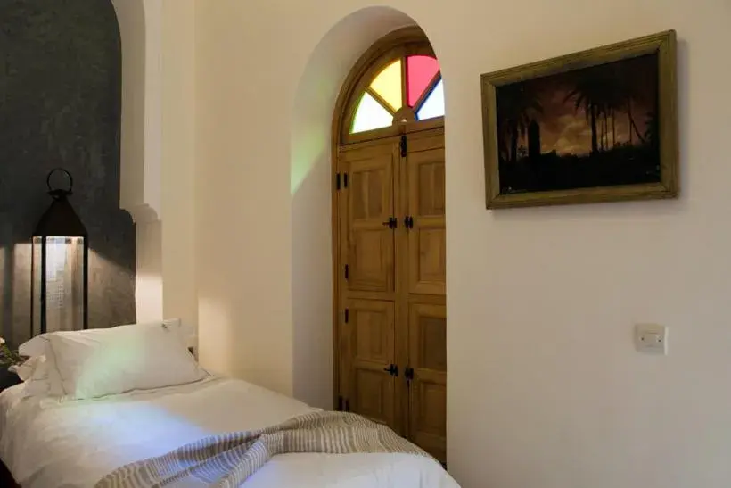 Bed in Riad Granvilier Bed in Riad Granvilier