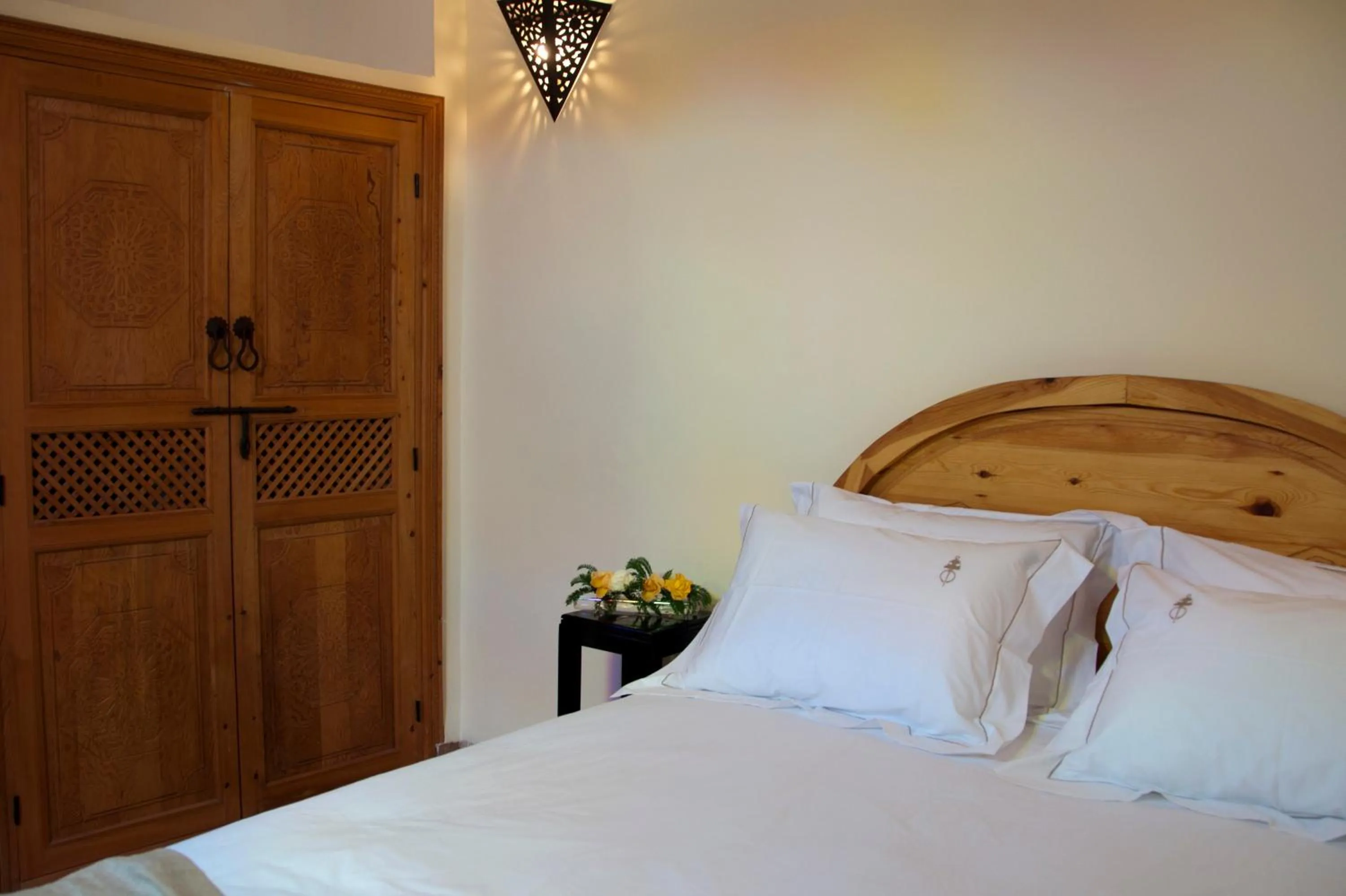 Bed in Riad Granvilier