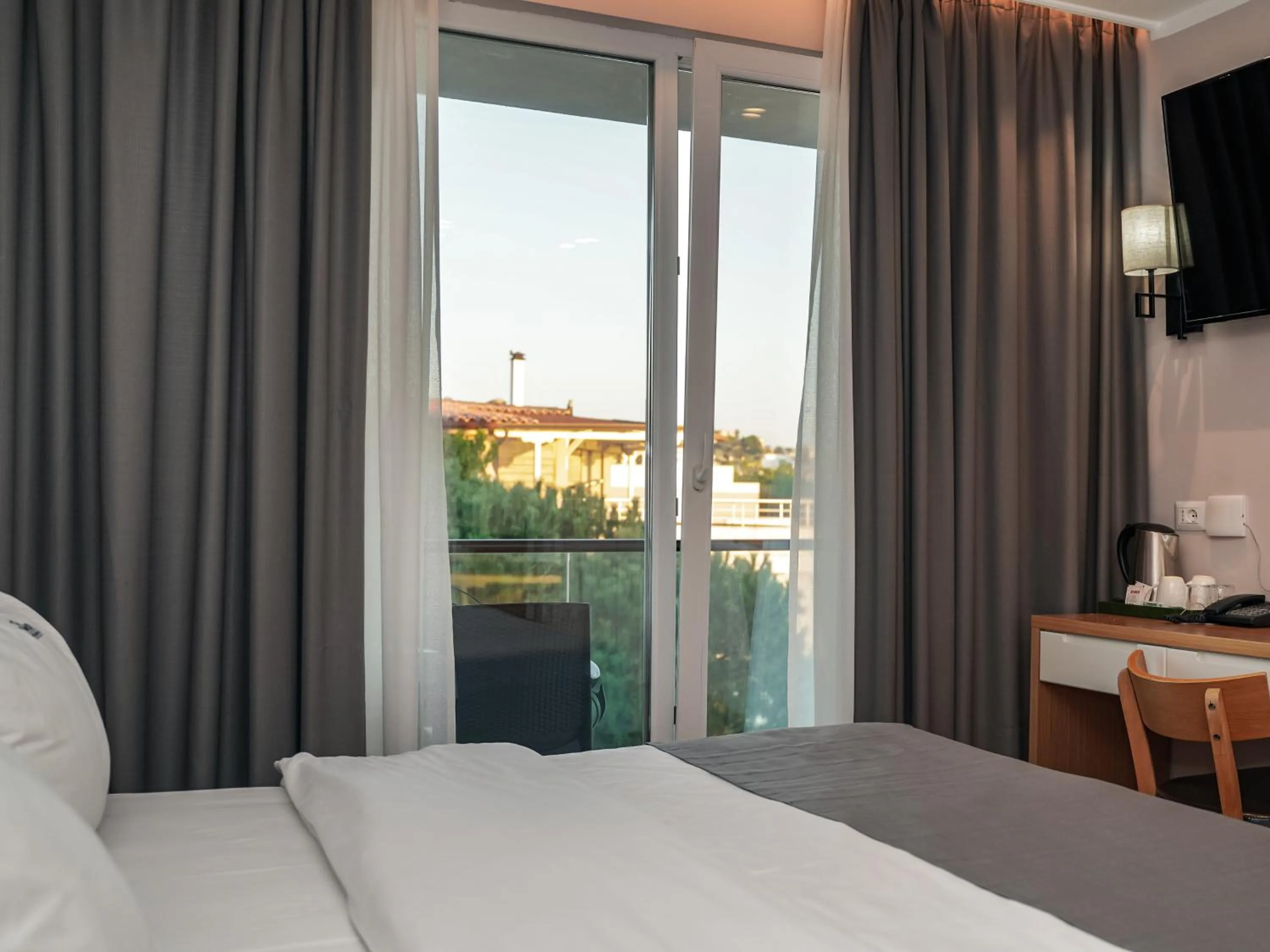 Bed in VM Resort & SPA