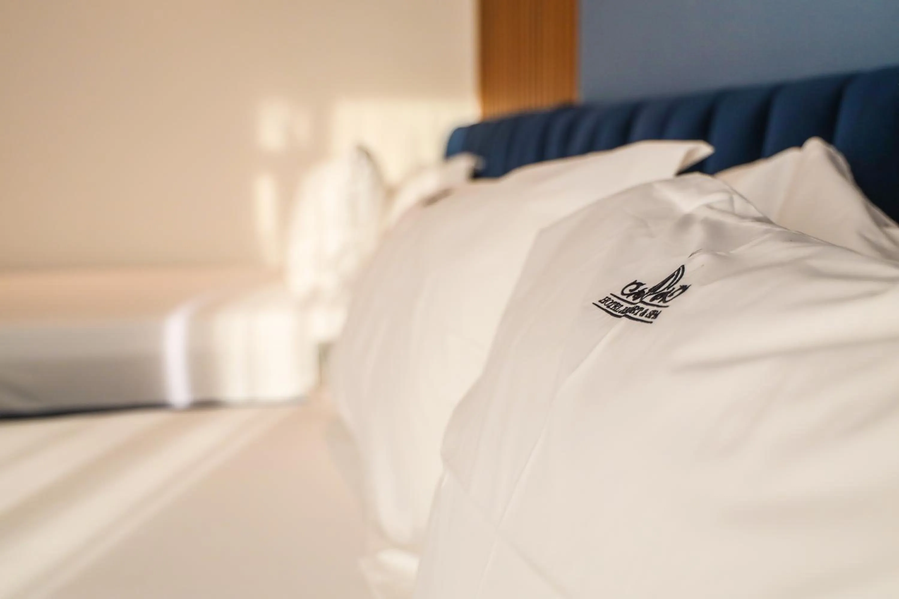 Bed in VM Resort & SPA