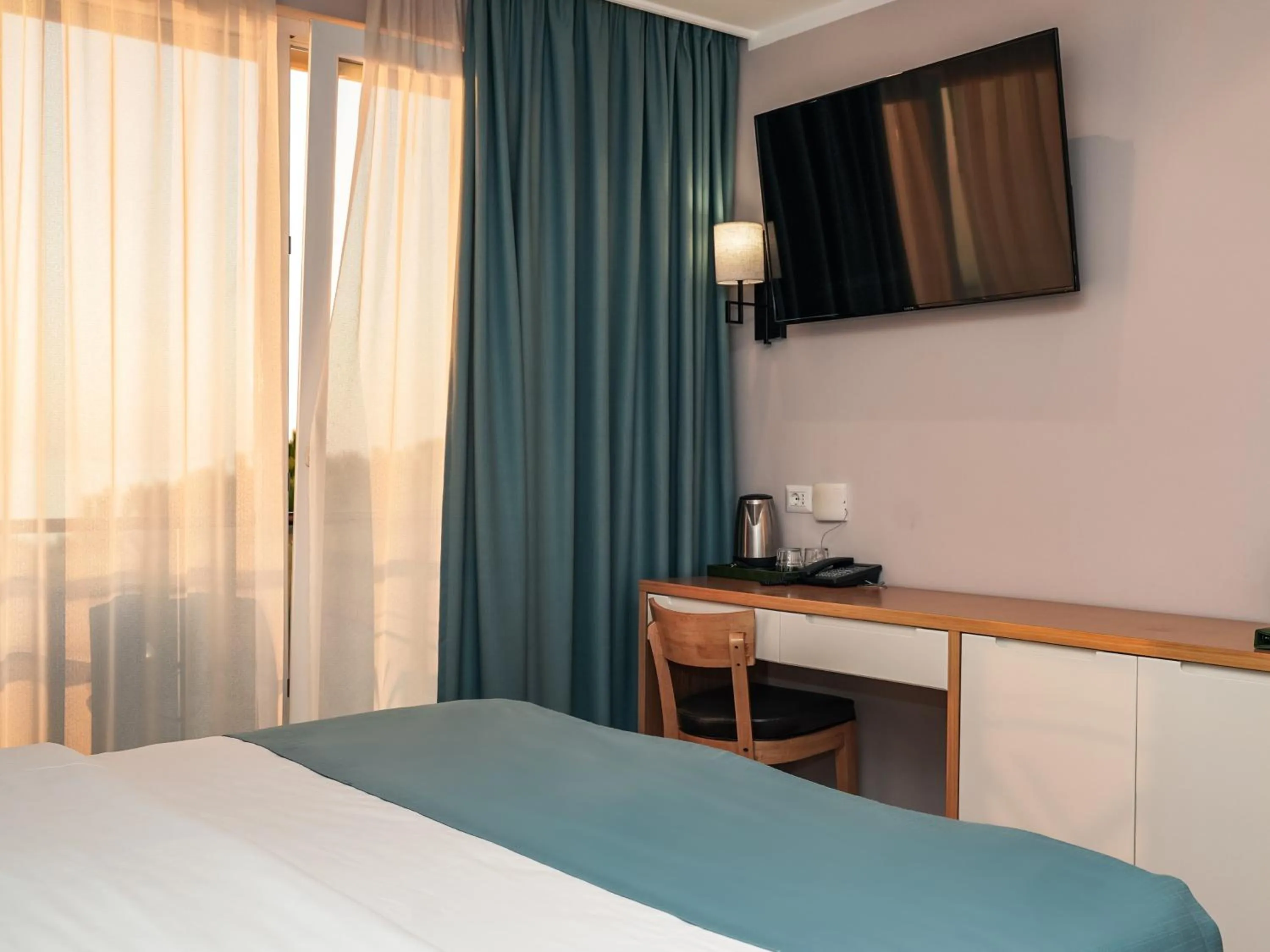 Bed in VM Resort & SPA