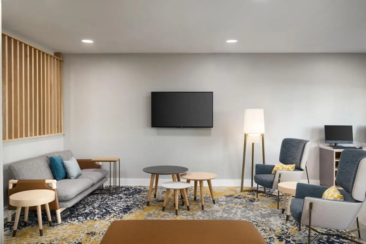 Seating area in TownePlace Suites by Marriott Charlotte LoSo Airport