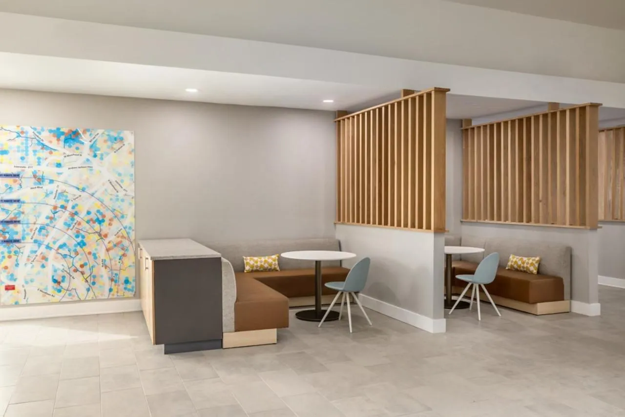 Seating area in TownePlace Suites by Marriott Charlotte LoSo Airport