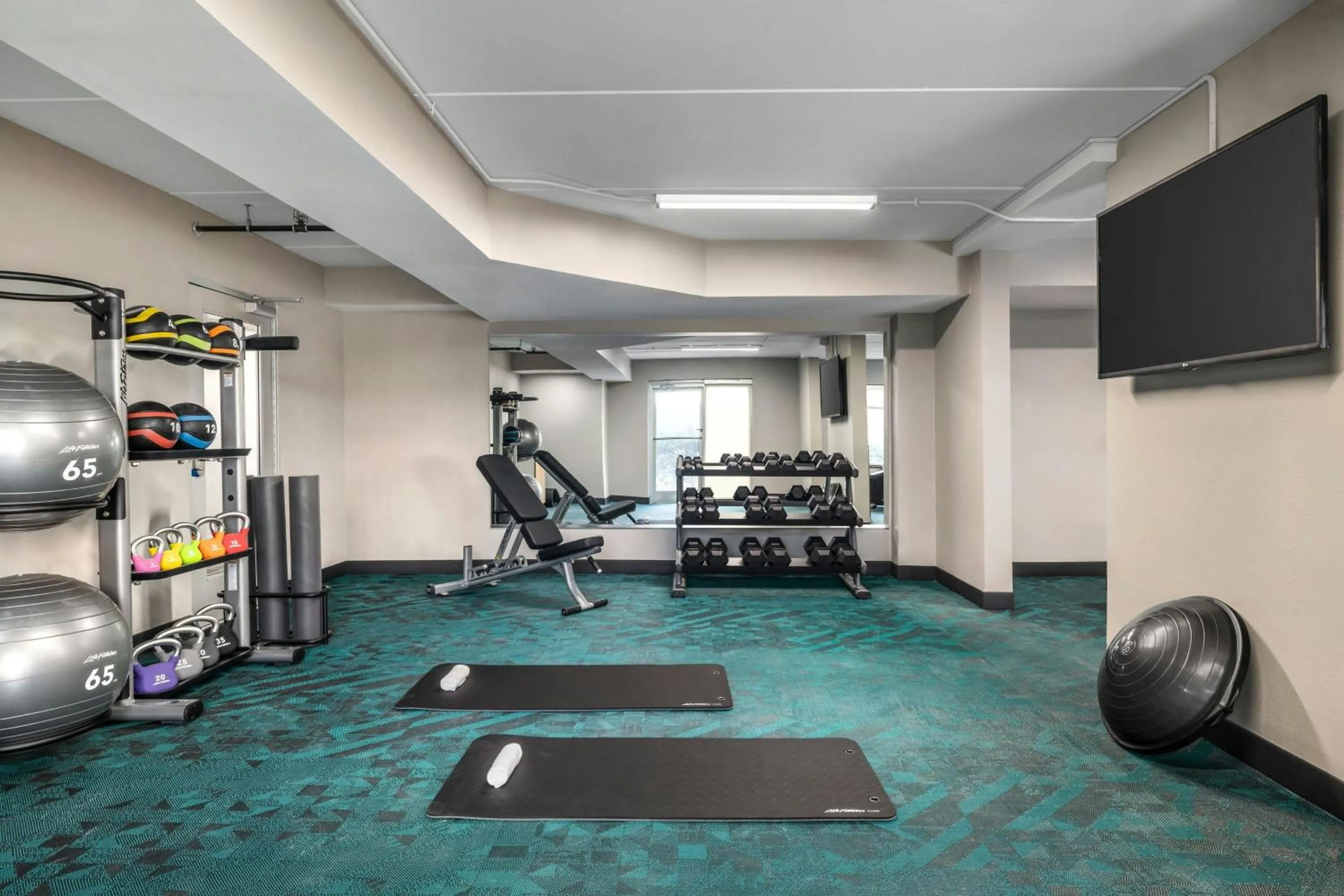 Fitness centre/facilities in TownePlace Suites by Marriott Charlotte LoSo Airport
