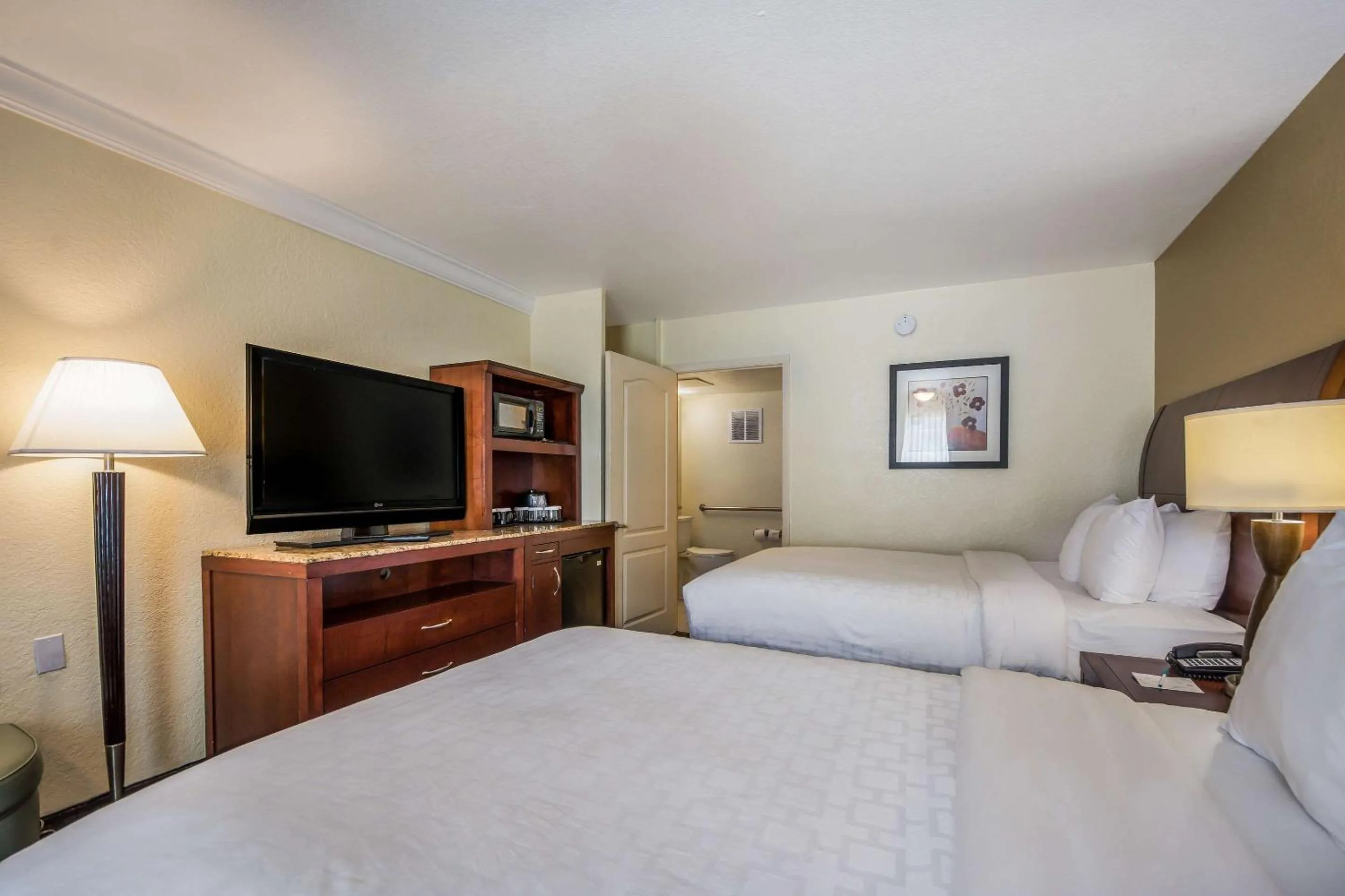 Photo of the whole room, Bed in Clarion Inn & Suites Central Clearwater Beach