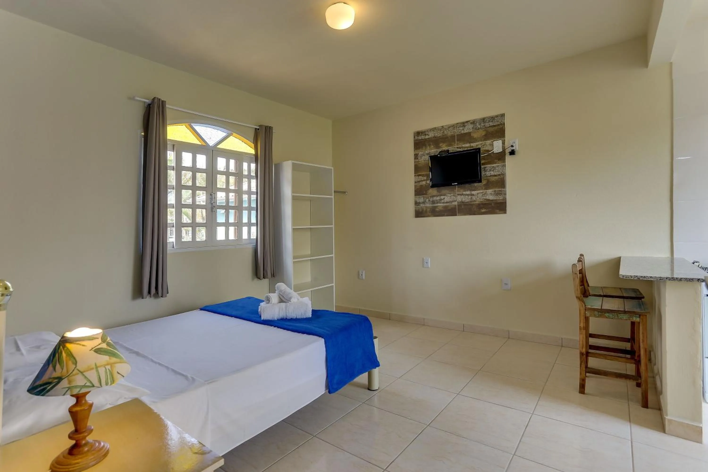 Bed in Pousada Carolina