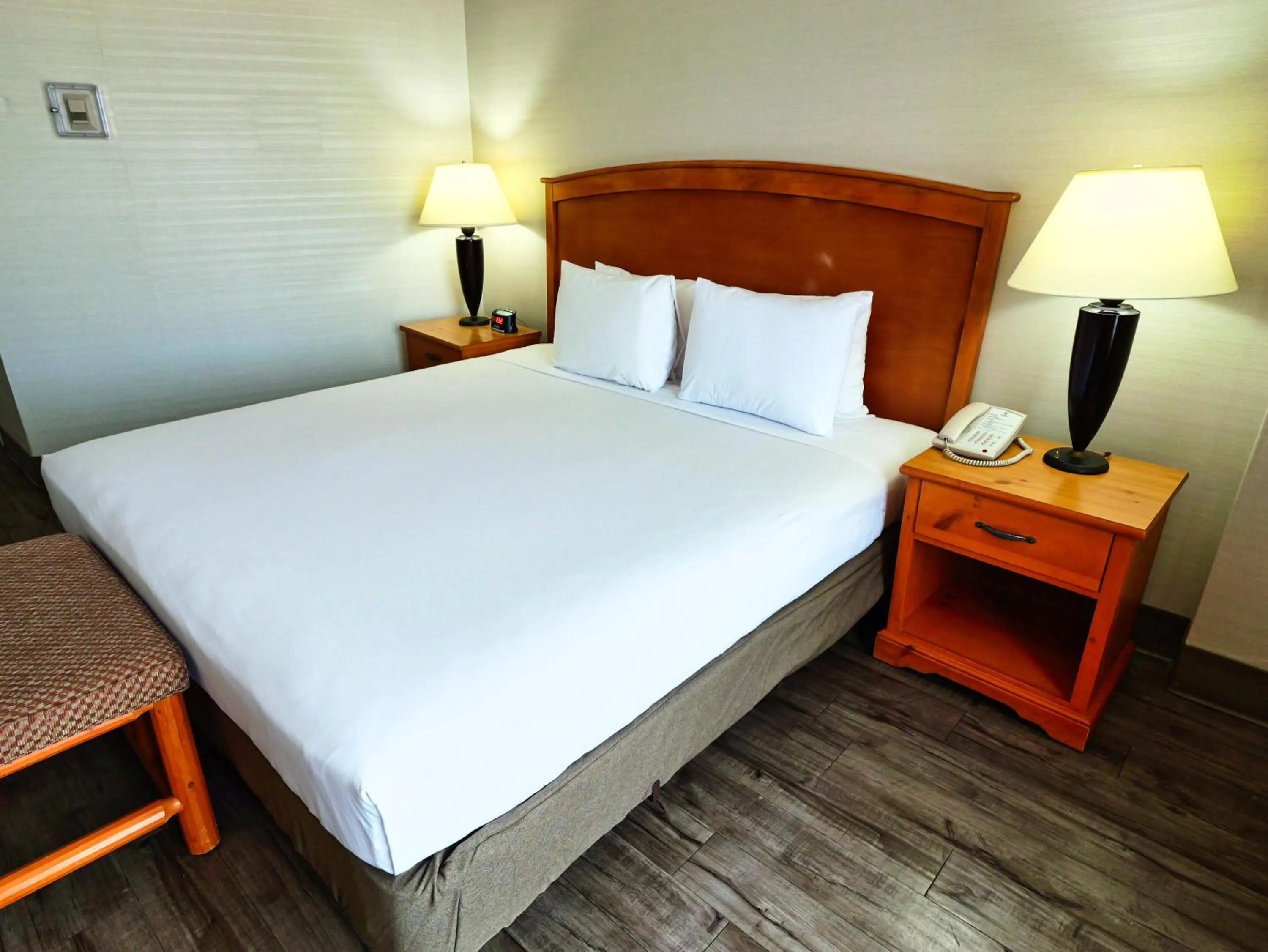 Bed in Continental Inn & Suites