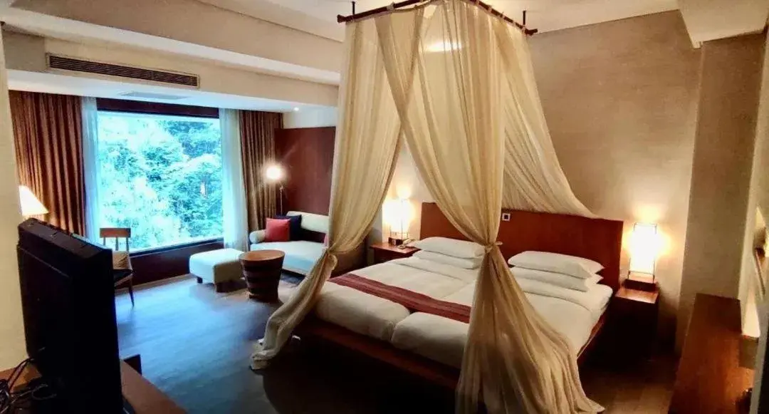 Bed in Volando Urai Spring Spa & Resort Bed in Volando Urai Spring Spa & Resort