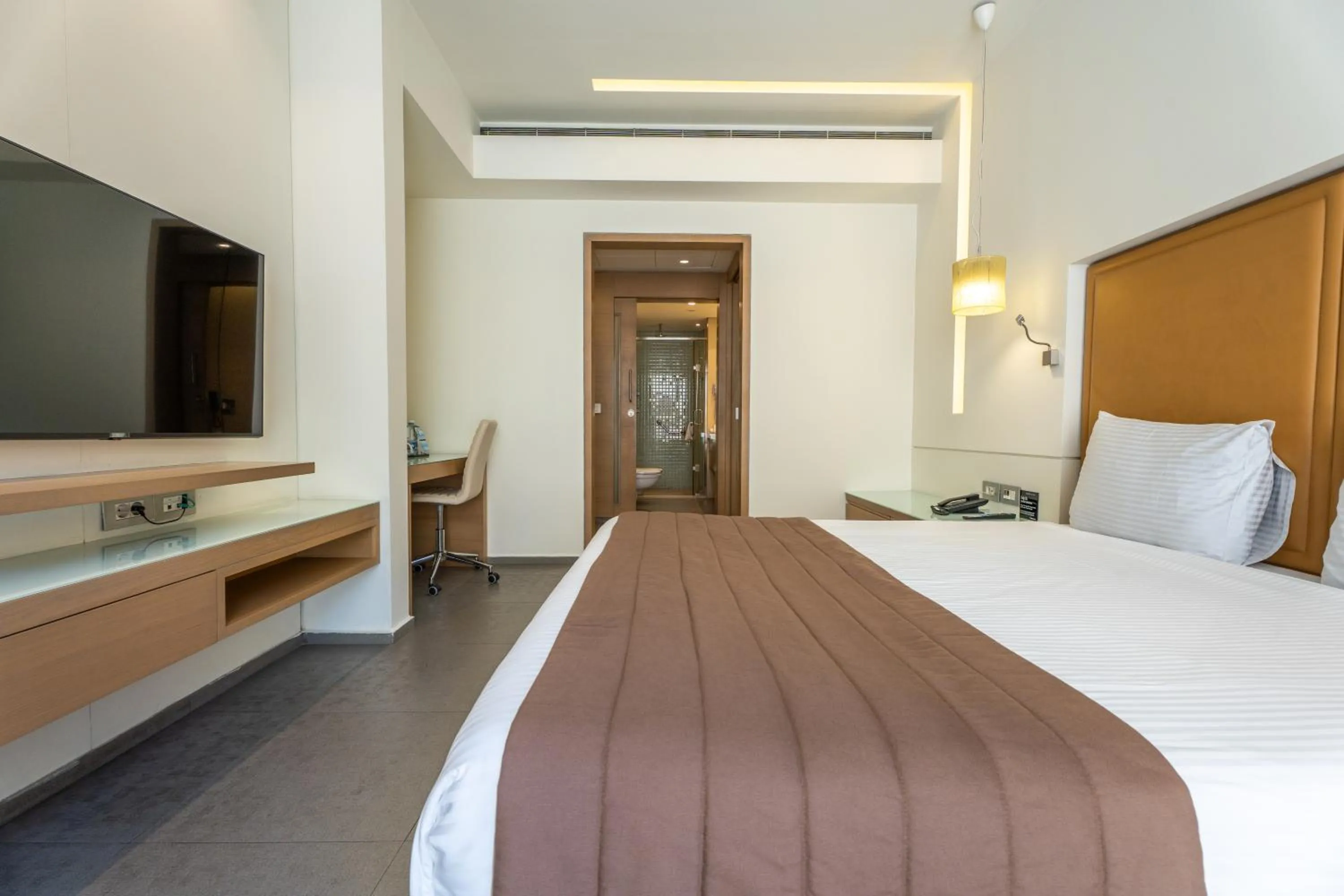 Bed in Saifi Suites Hotel