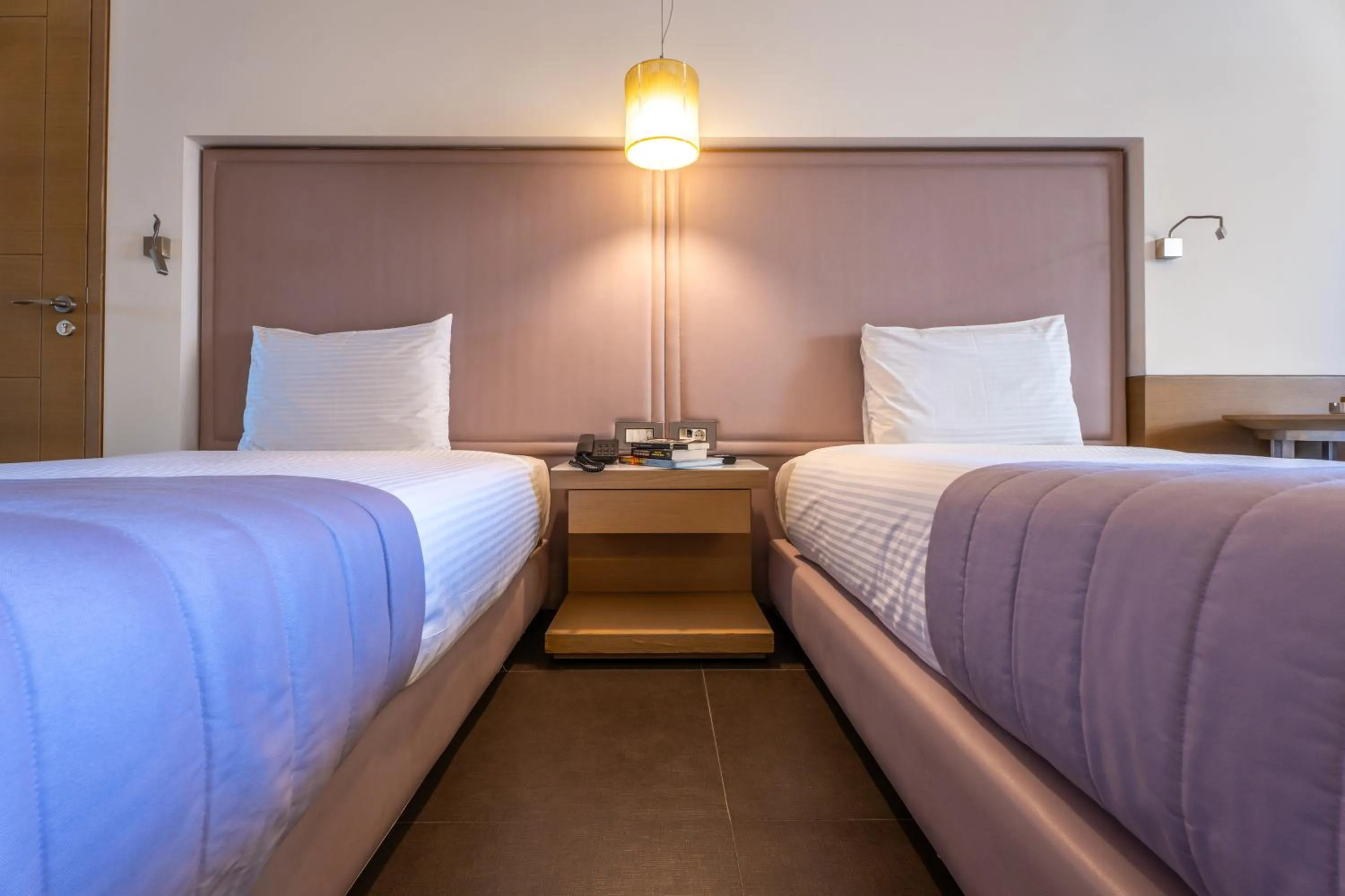 Bed in Saifi Suites Hotel