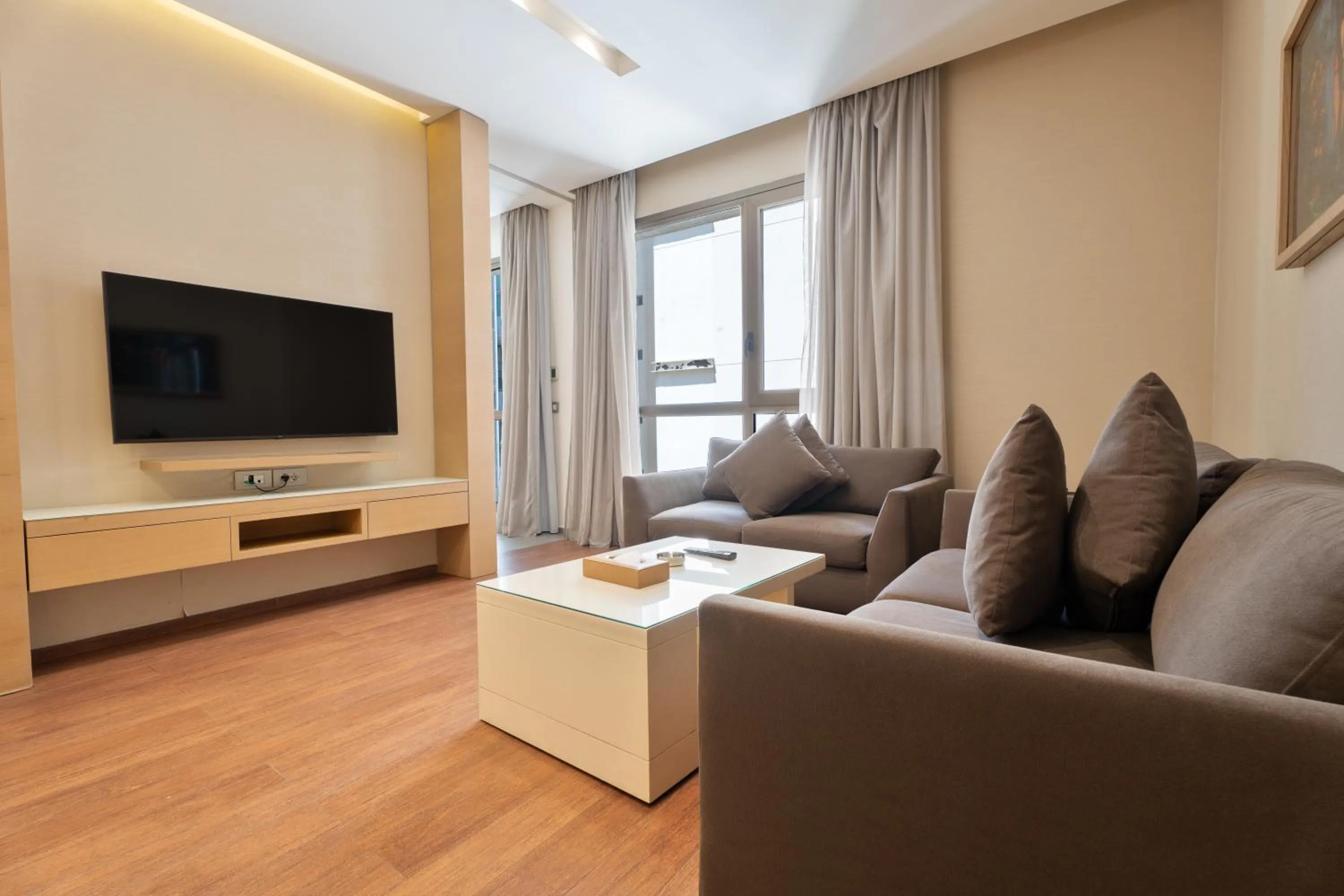 TV and multimedia in Saifi Suites Hotel