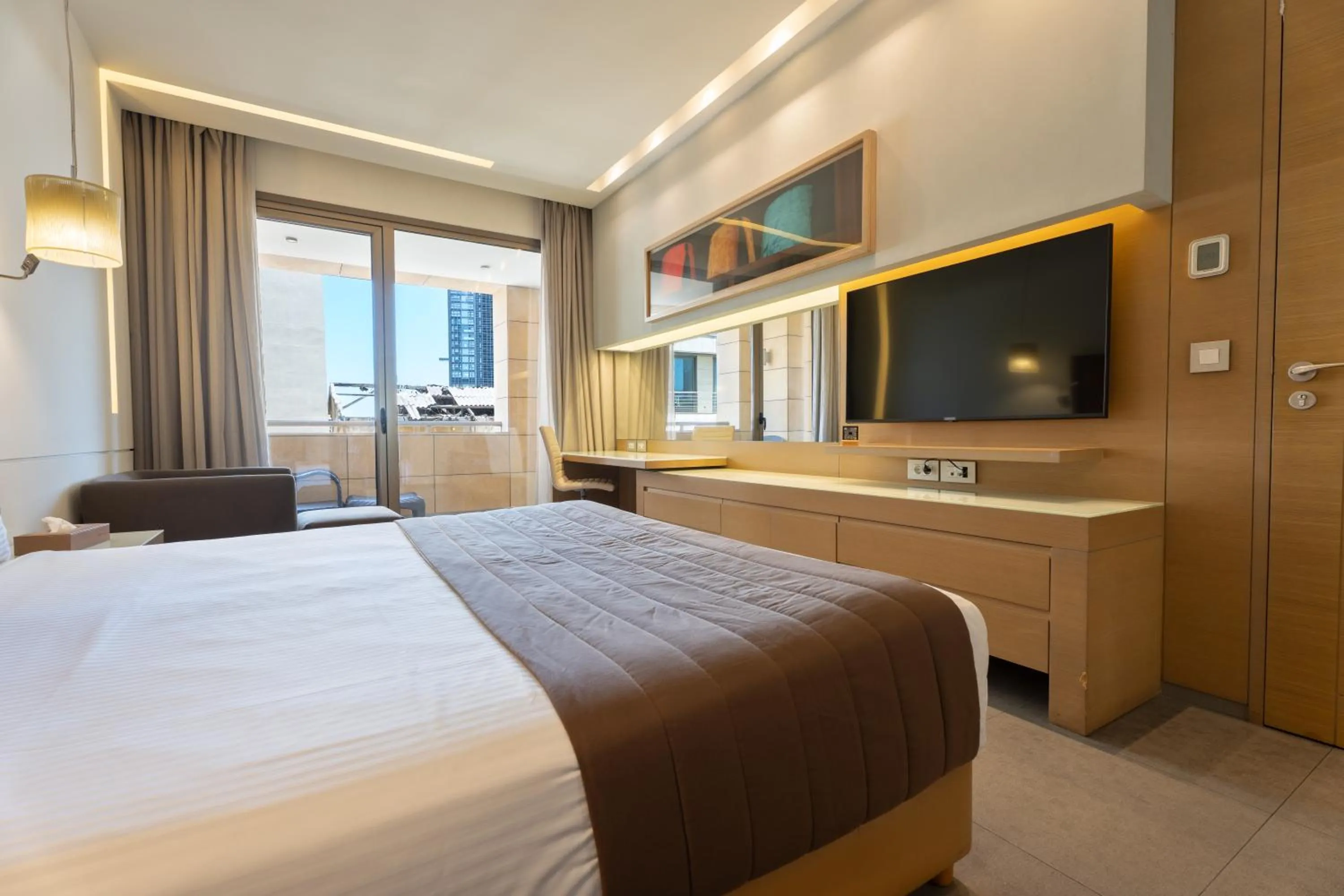 Bed in Saifi Suites Hotel