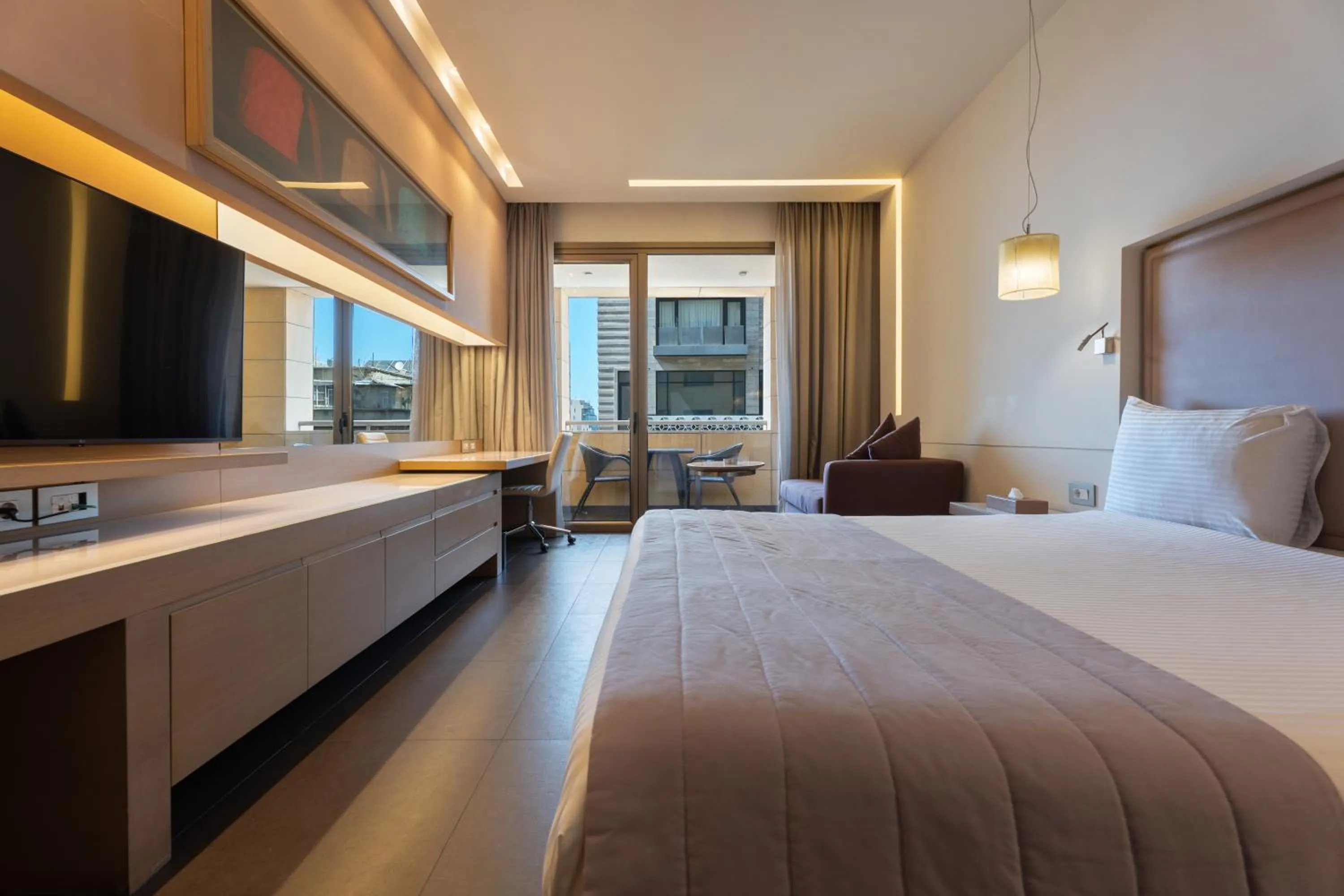 Bed in Saifi Suites Hotel