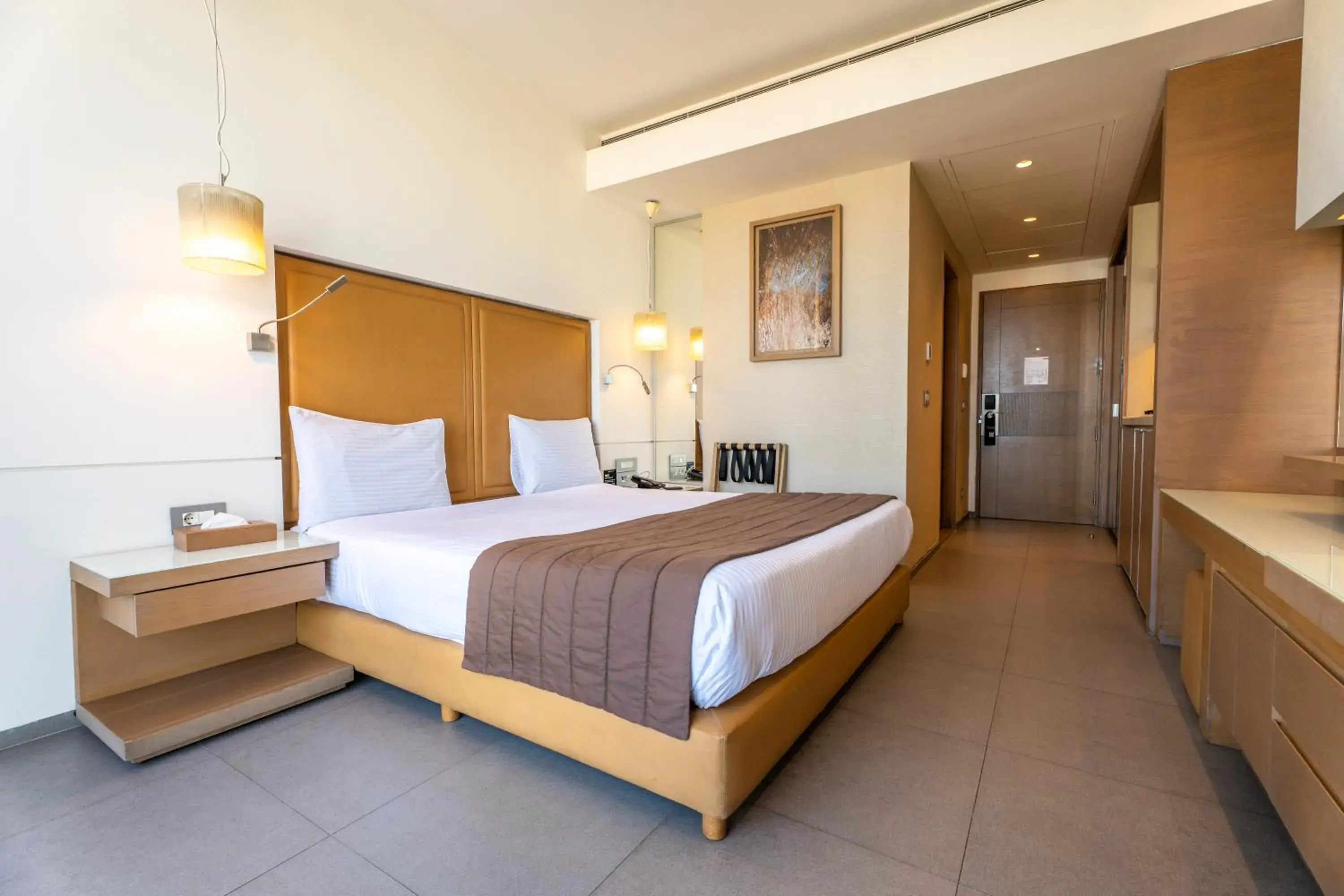 Bed in Saifi Suites Hotel Bed in Saifi Suites Hotel