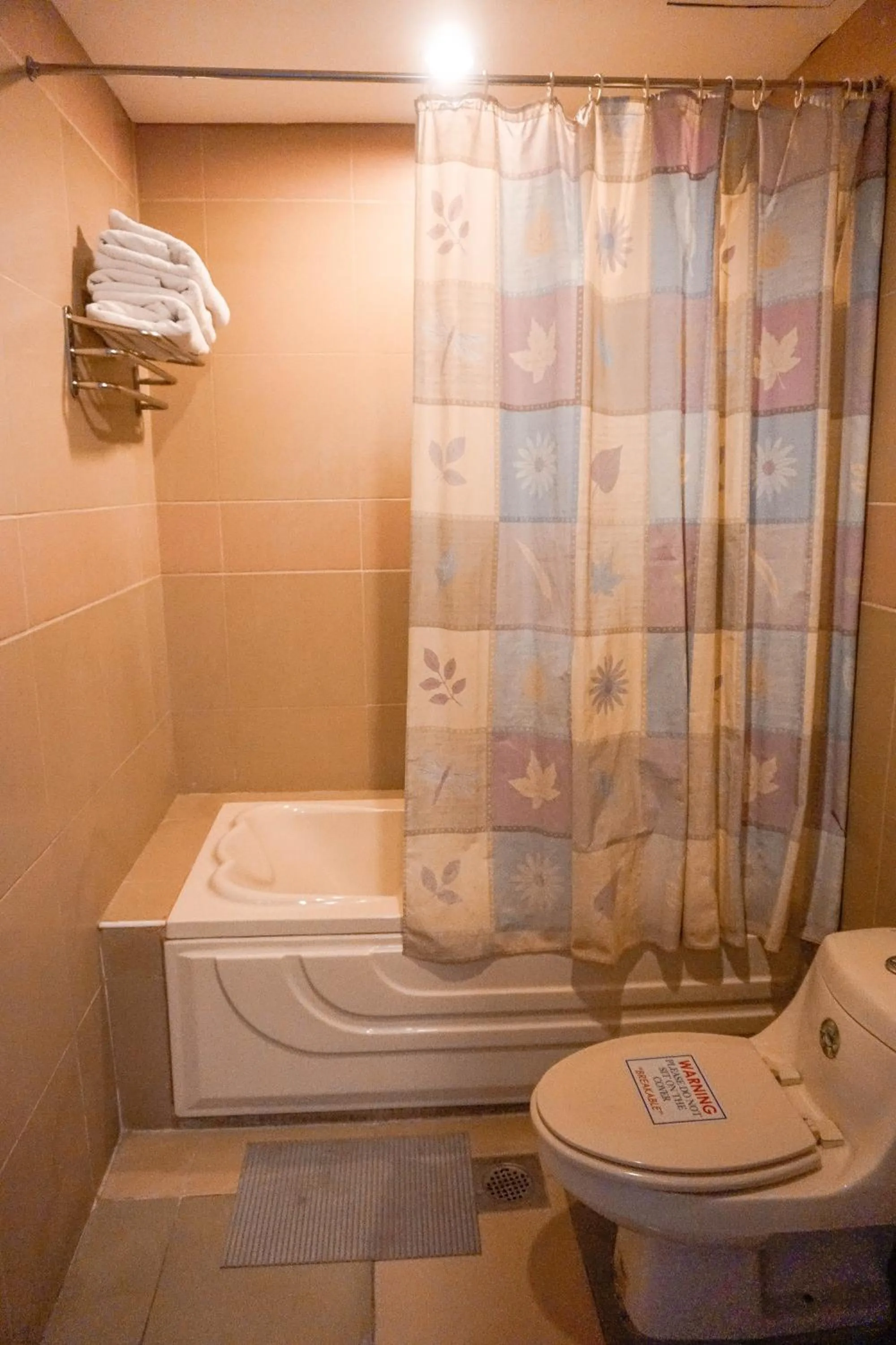 Toilet in Crowne Garden Hotel