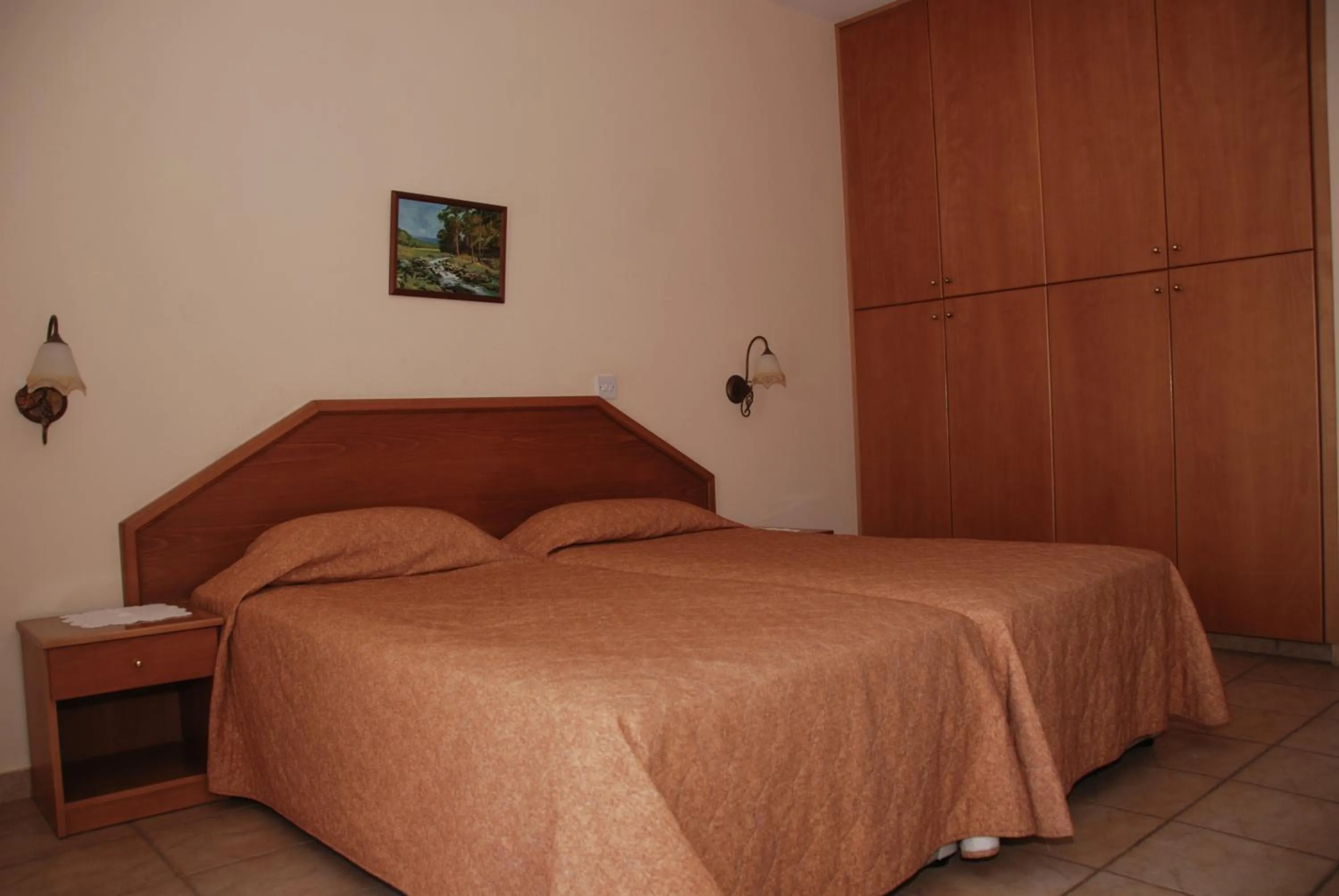 Bed in Kotzias Beach Apartments