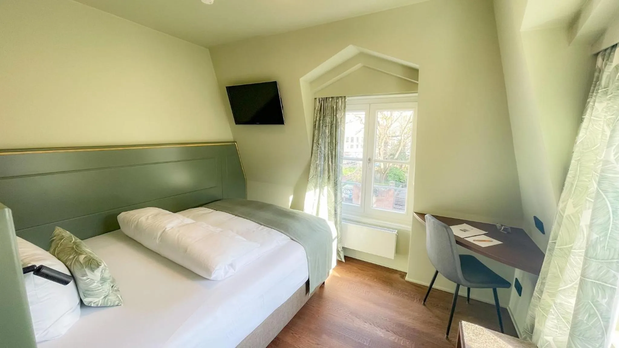 Bed in Boutique Hotel Orangerie