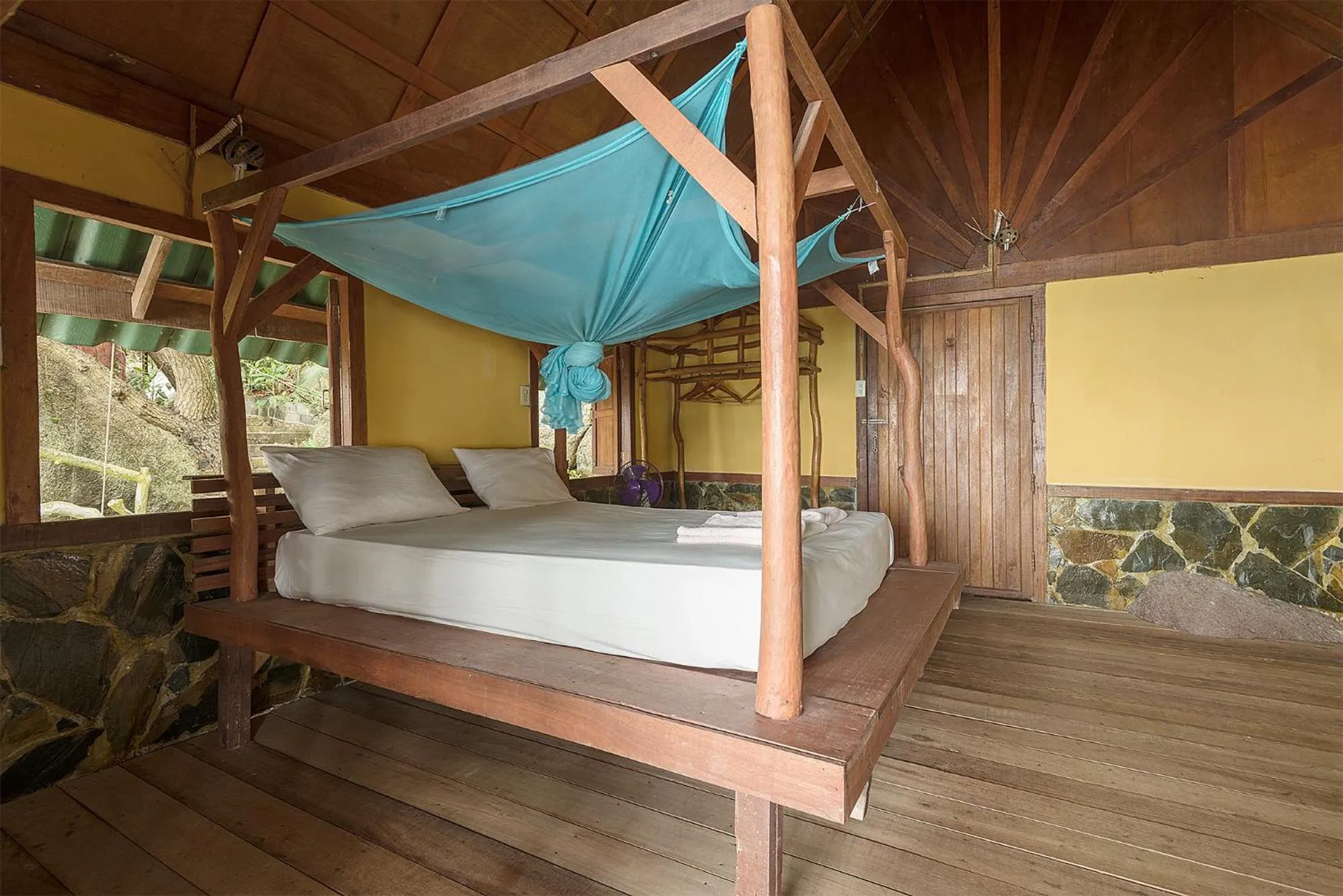 Bed in Mai Pen Rai Bungalows