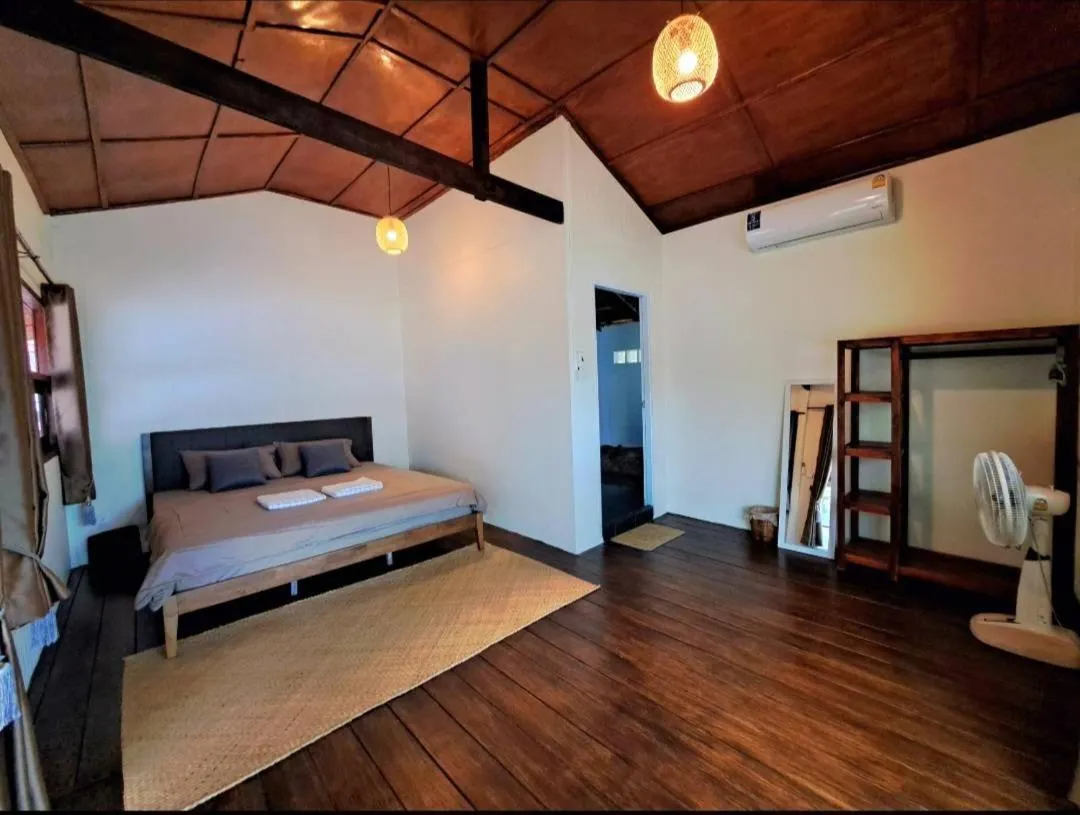 Bed in Mai Pen Rai Bungalows