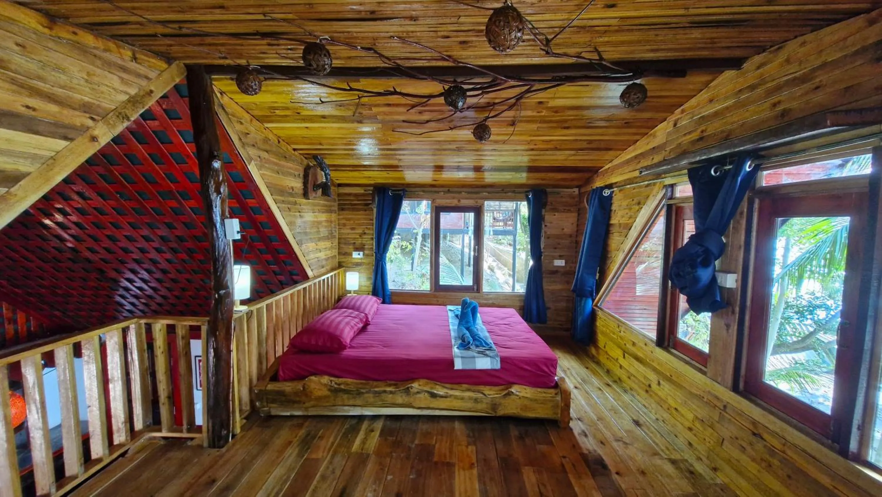 Bed in Mai Pen Rai Bungalows