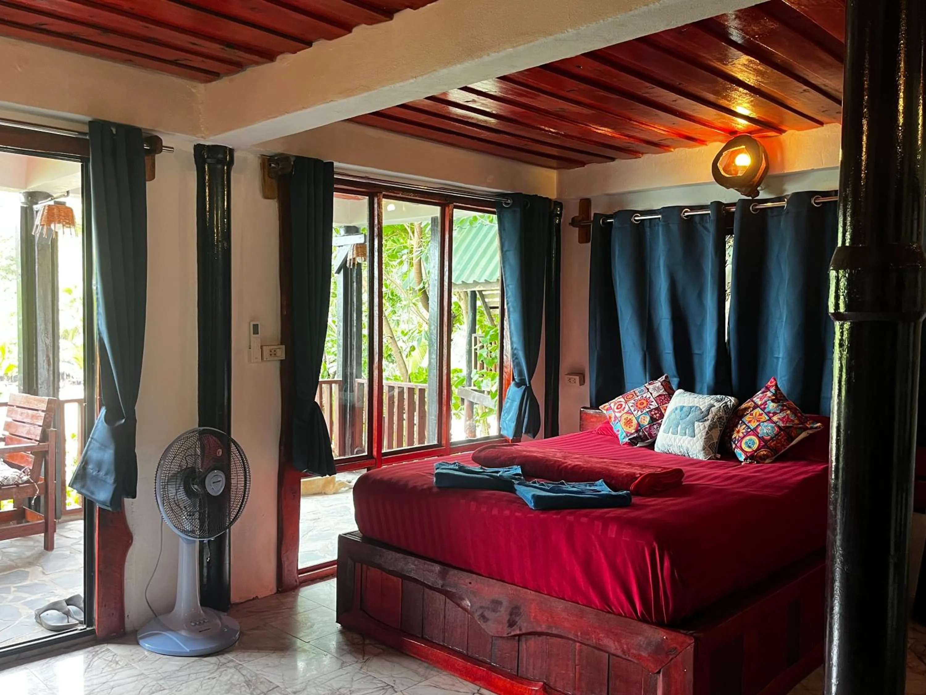 Bed in Mai Pen Rai Bungalows