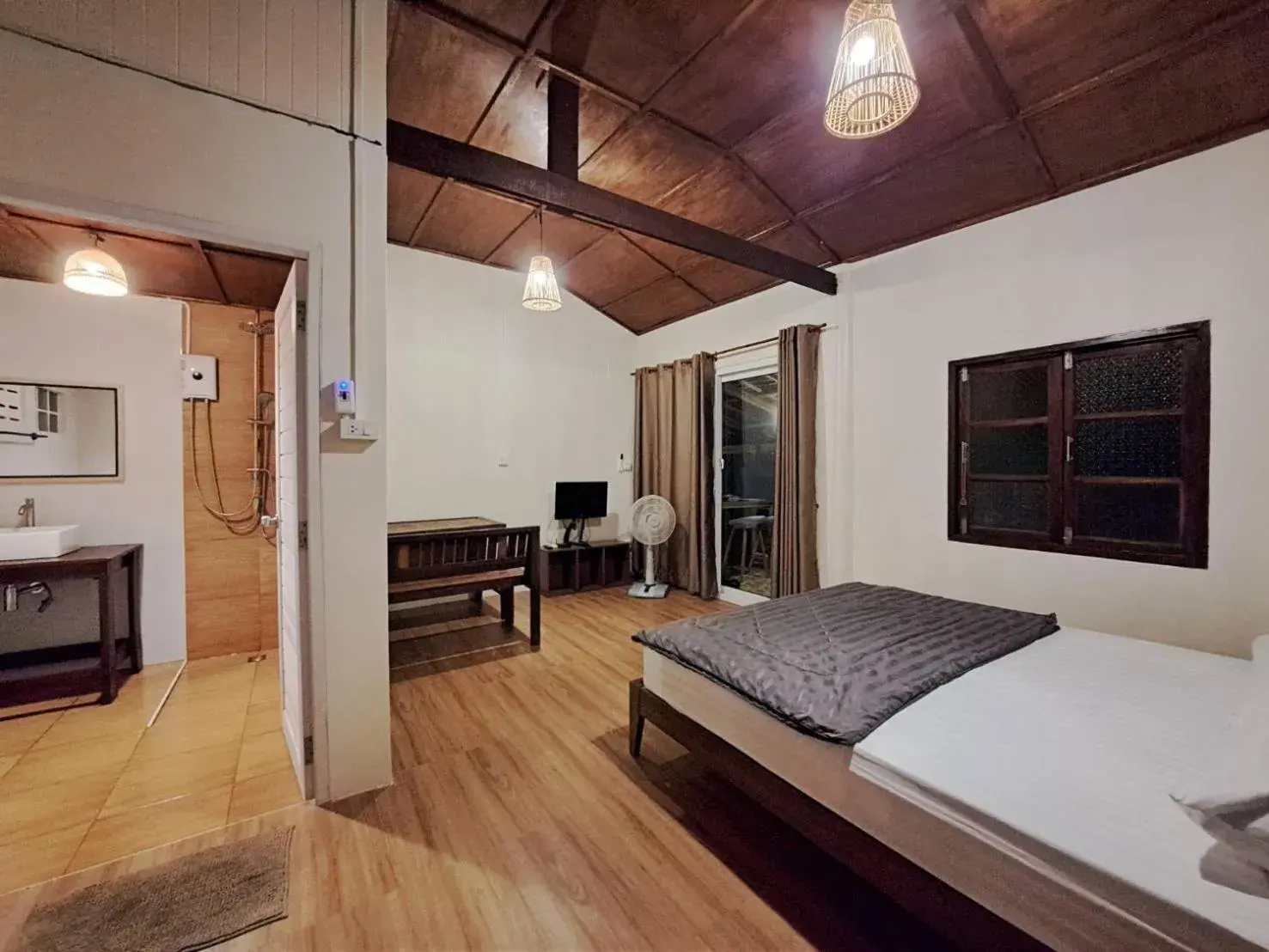 Bed in Mai Pen Rai Bungalows Bed in Mai Pen Rai Bungalows