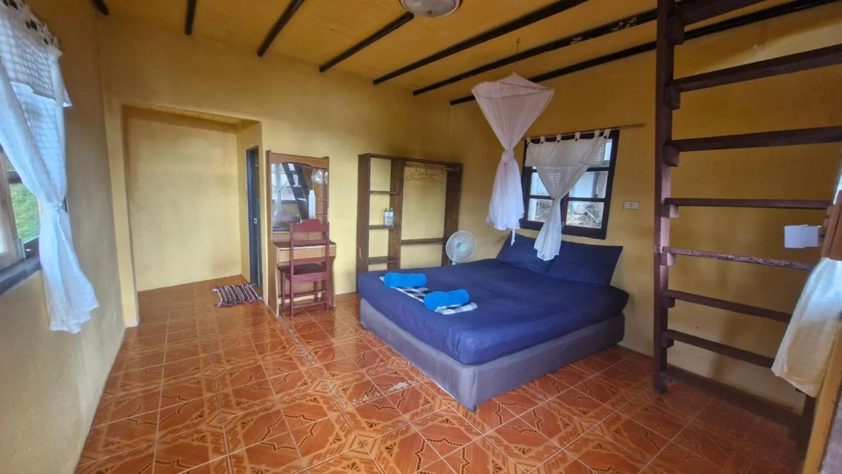 Bed in Mai Pen Rai Bungalows