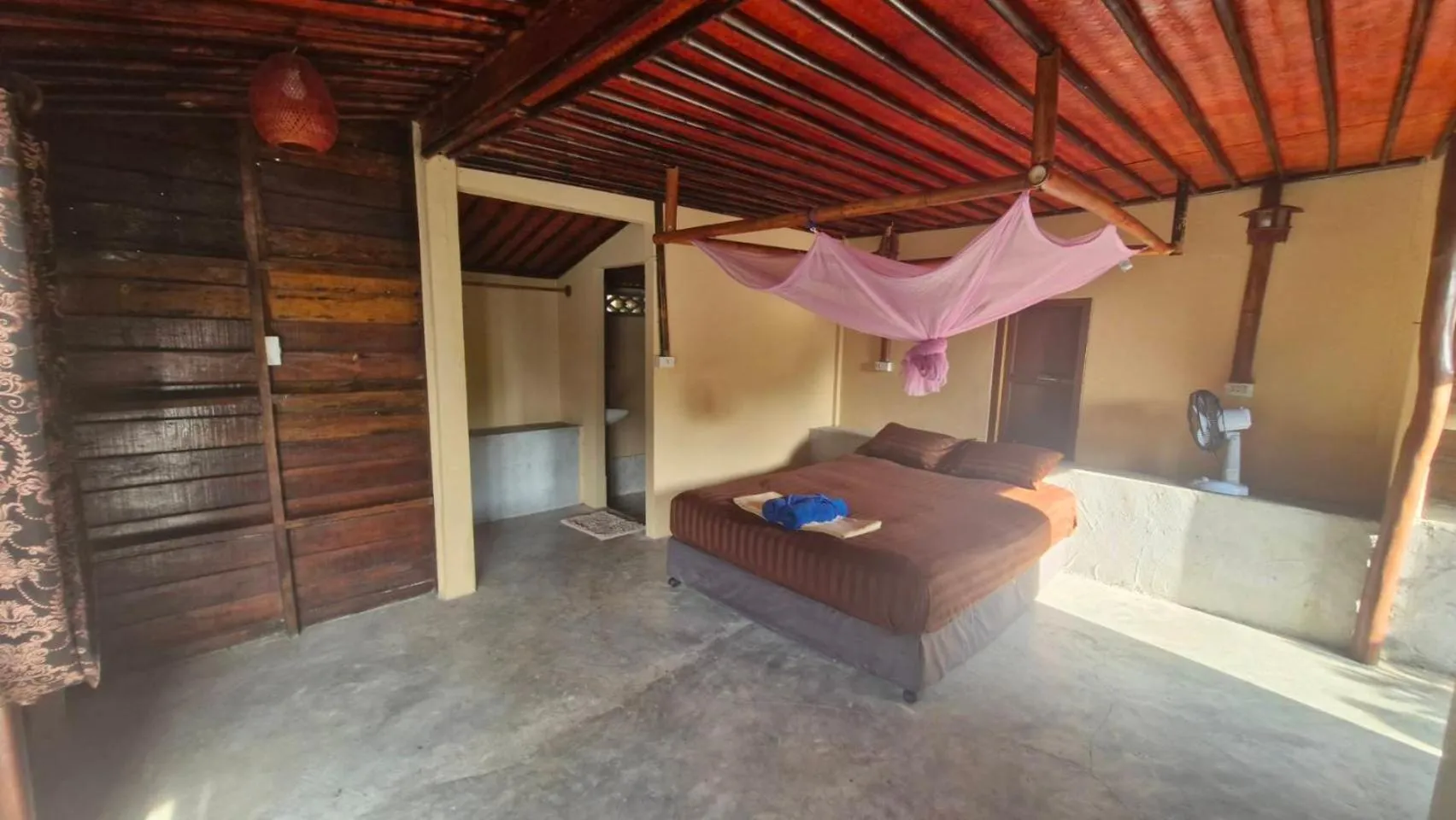 Bed in Mai Pen Rai Bungalows