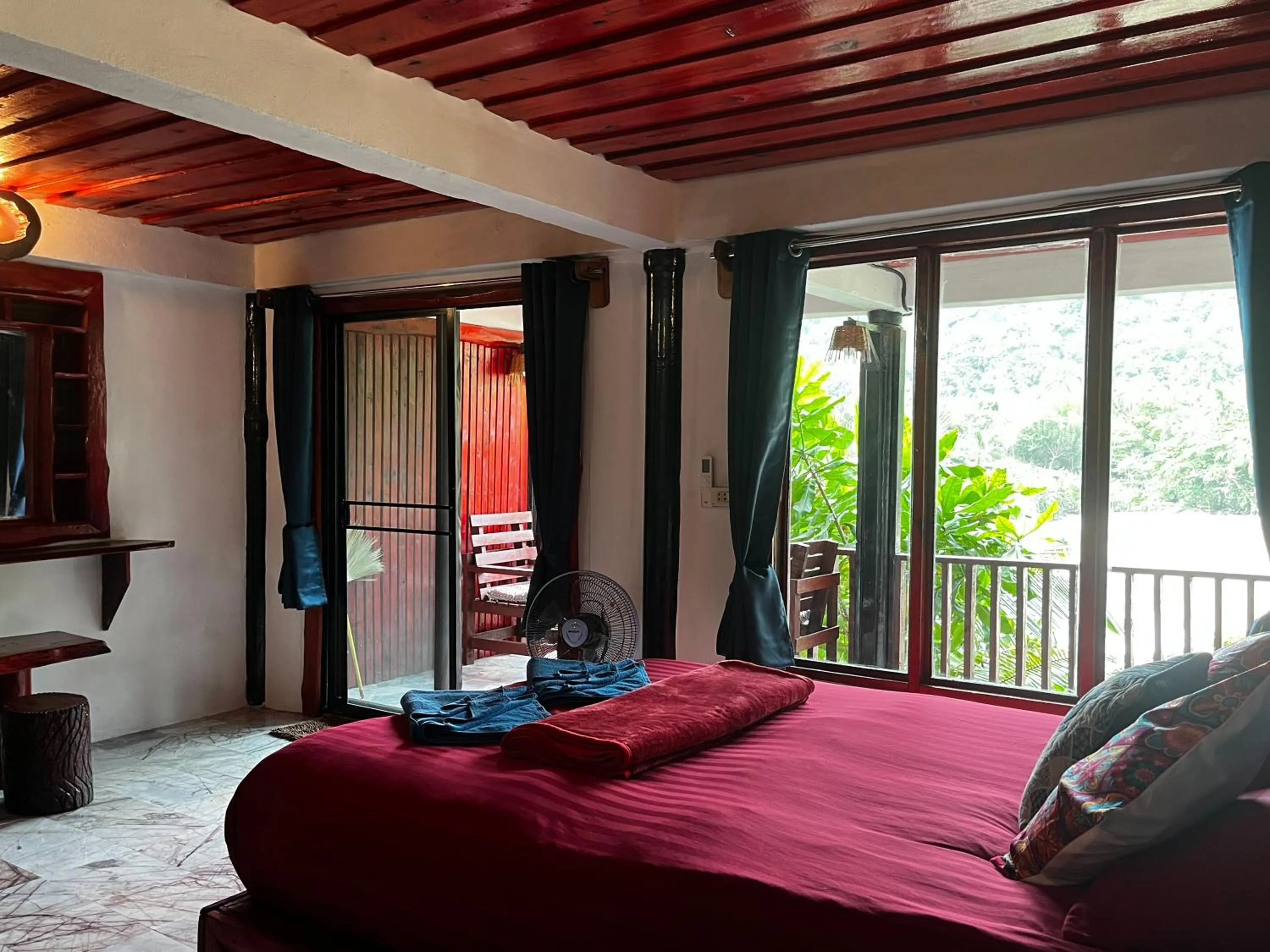 Bed in Mai Pen Rai Bungalows