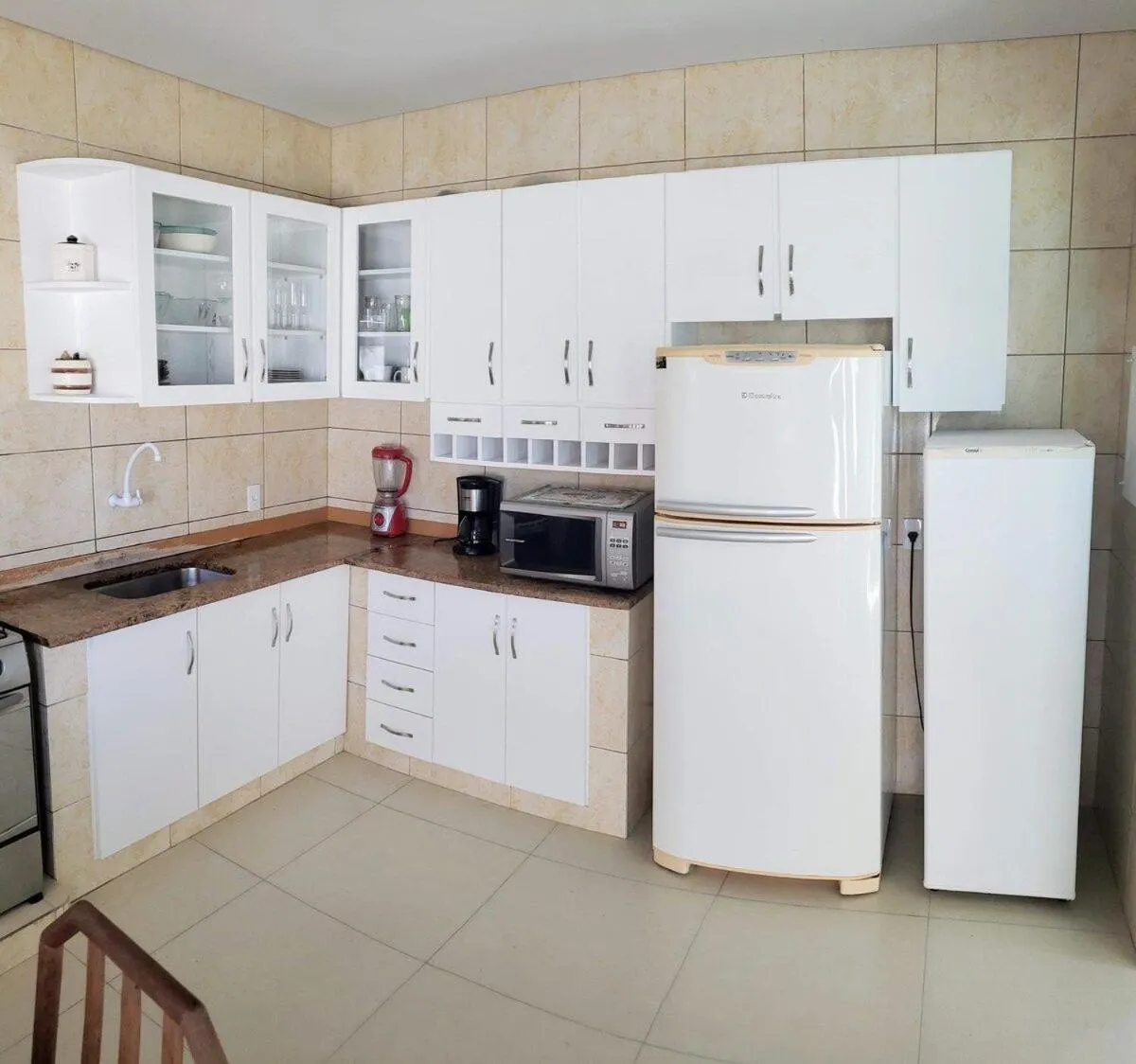 Kitchen or kitchenette in Pousada Souza