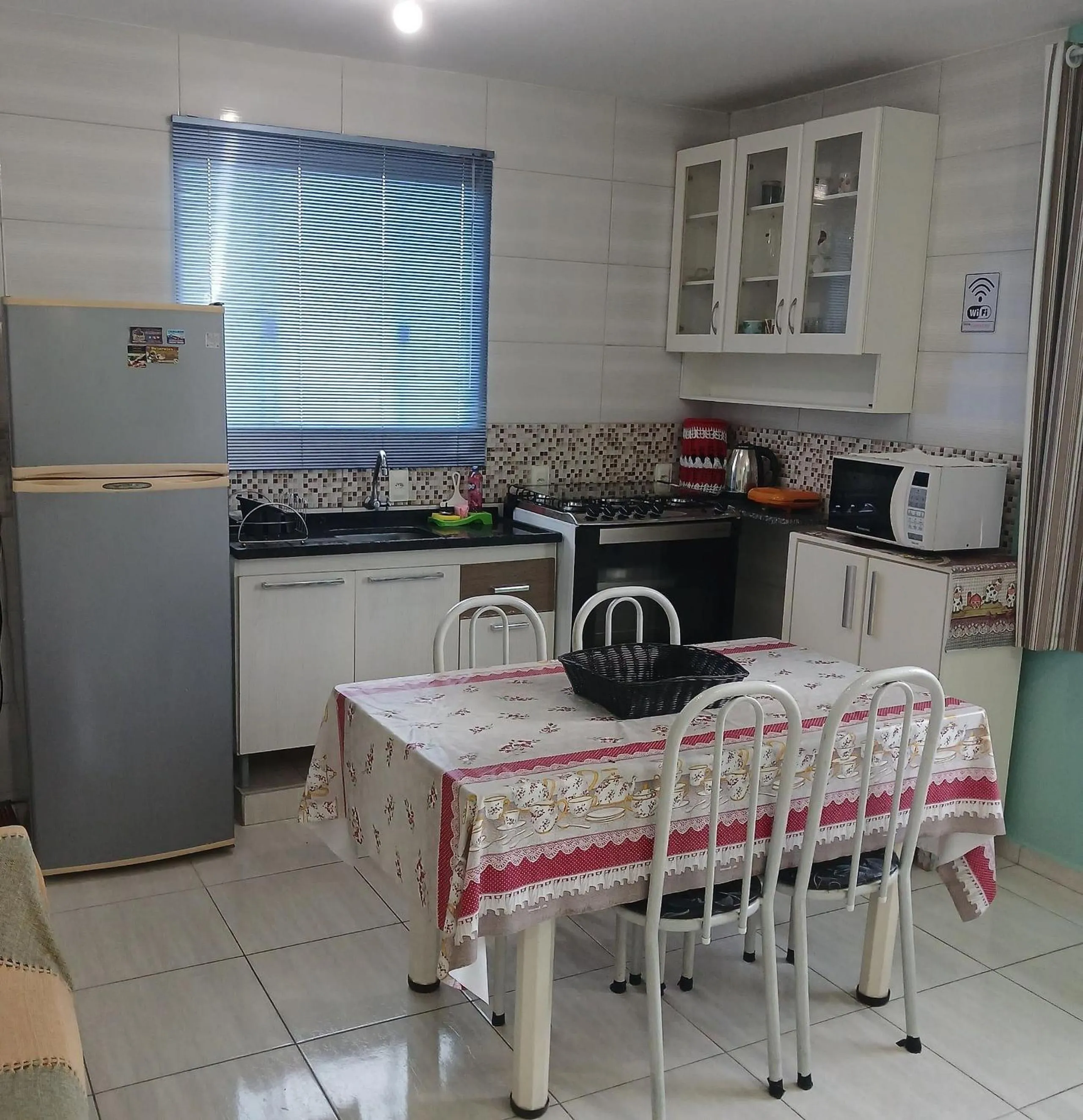 Kitchen or kitchenette in Pousada Souza