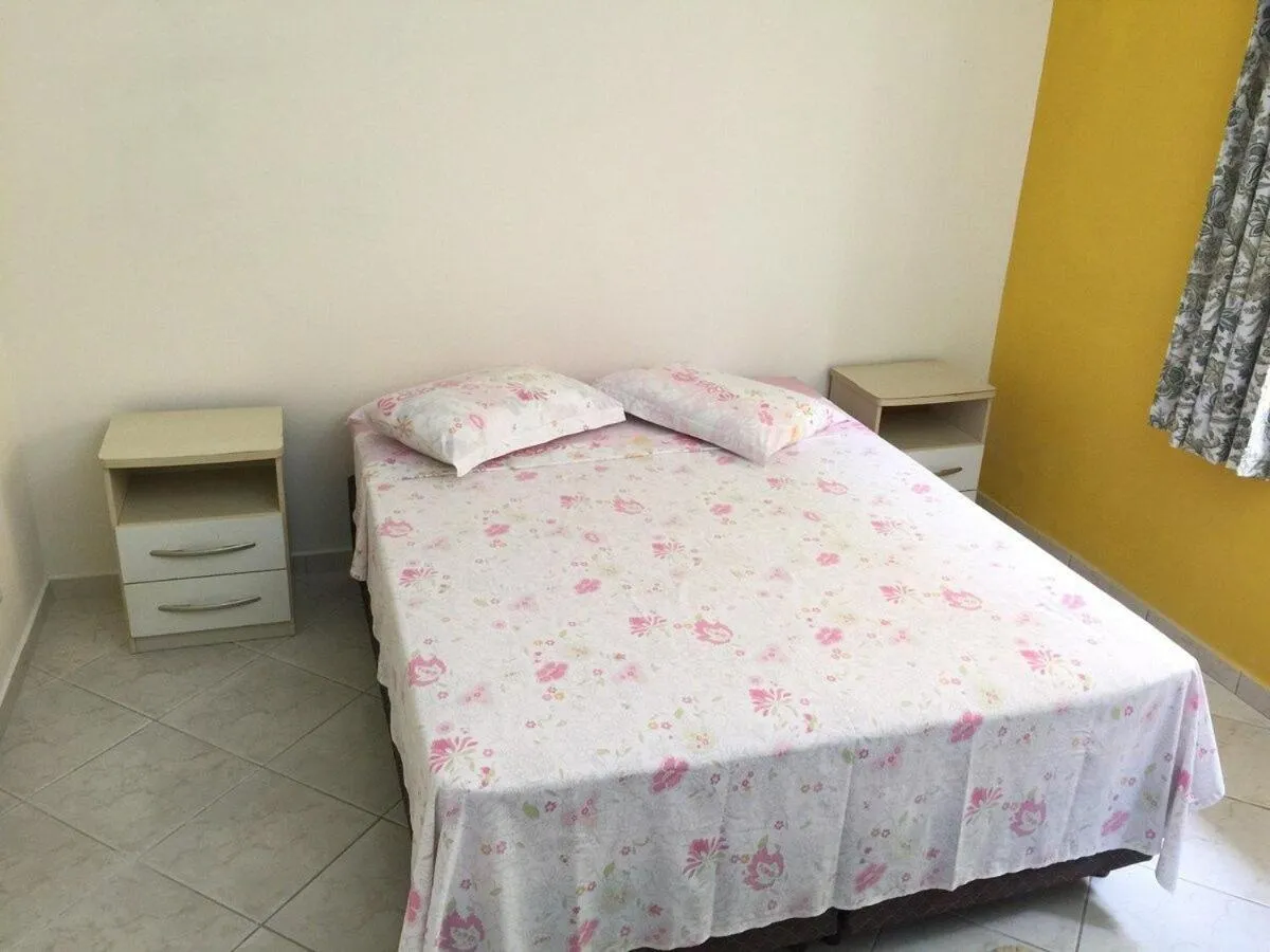 Bed in Pousada Souza