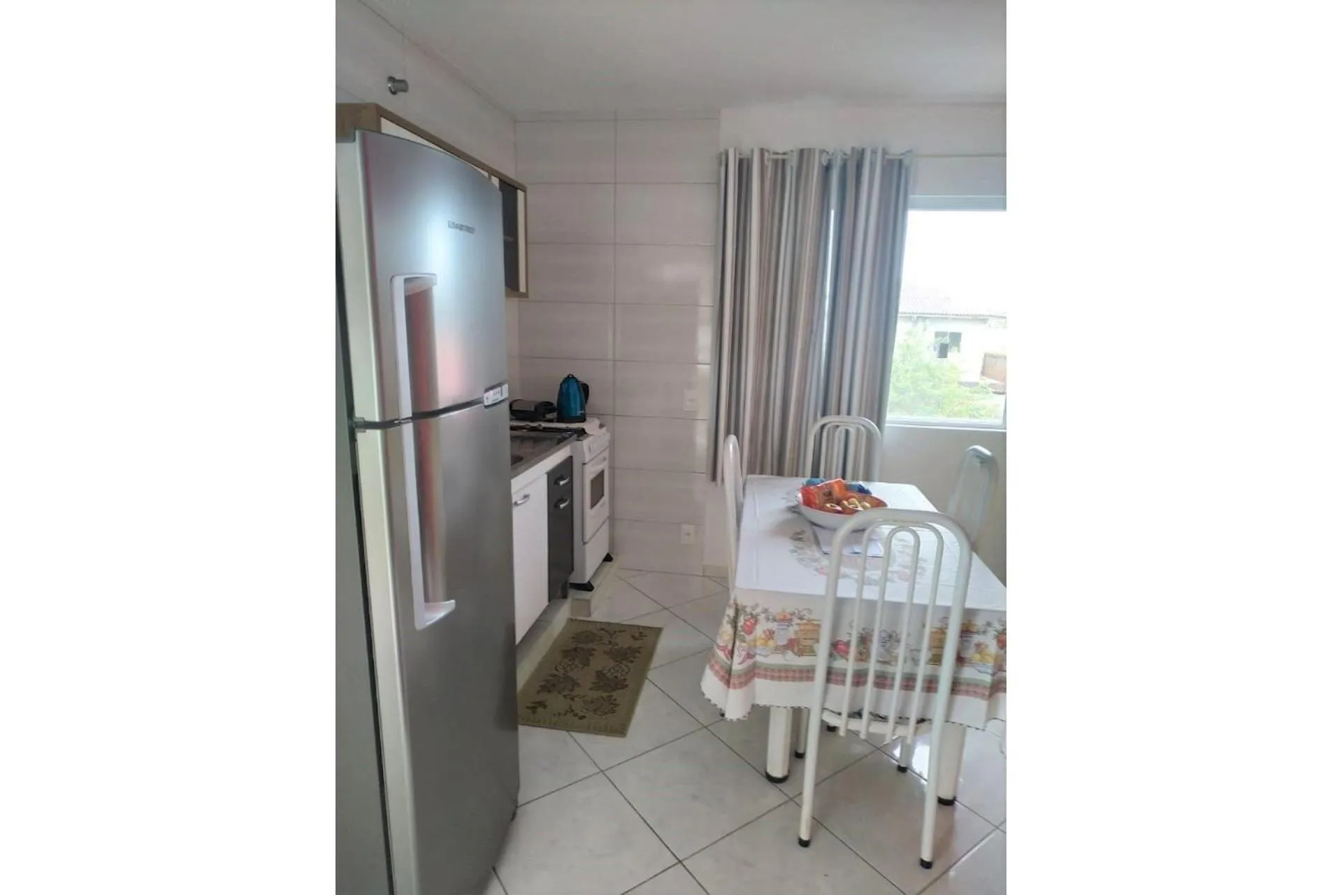 Kitchen or kitchenette in Pousada Souza