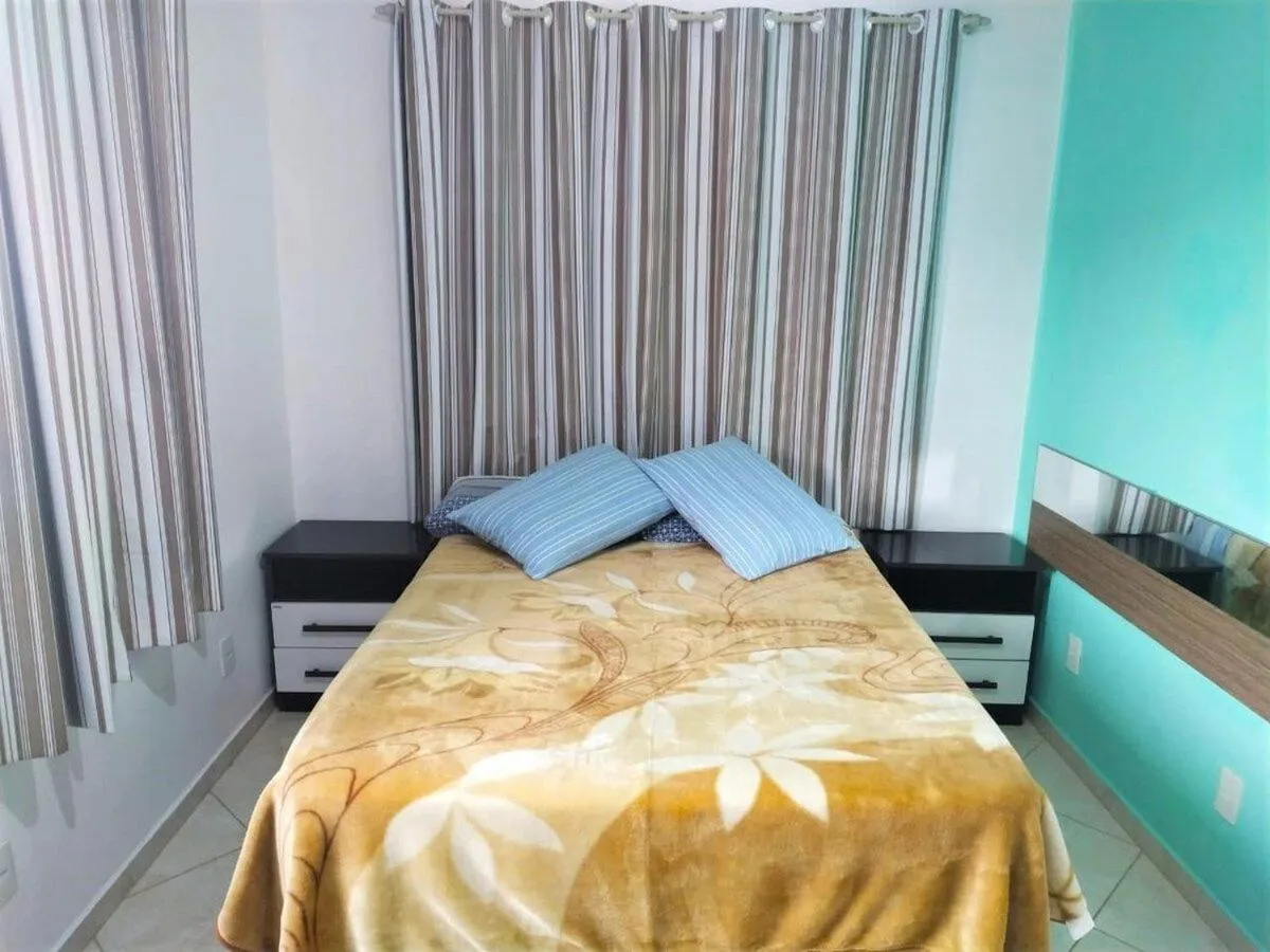 Bed in Pousada Souza