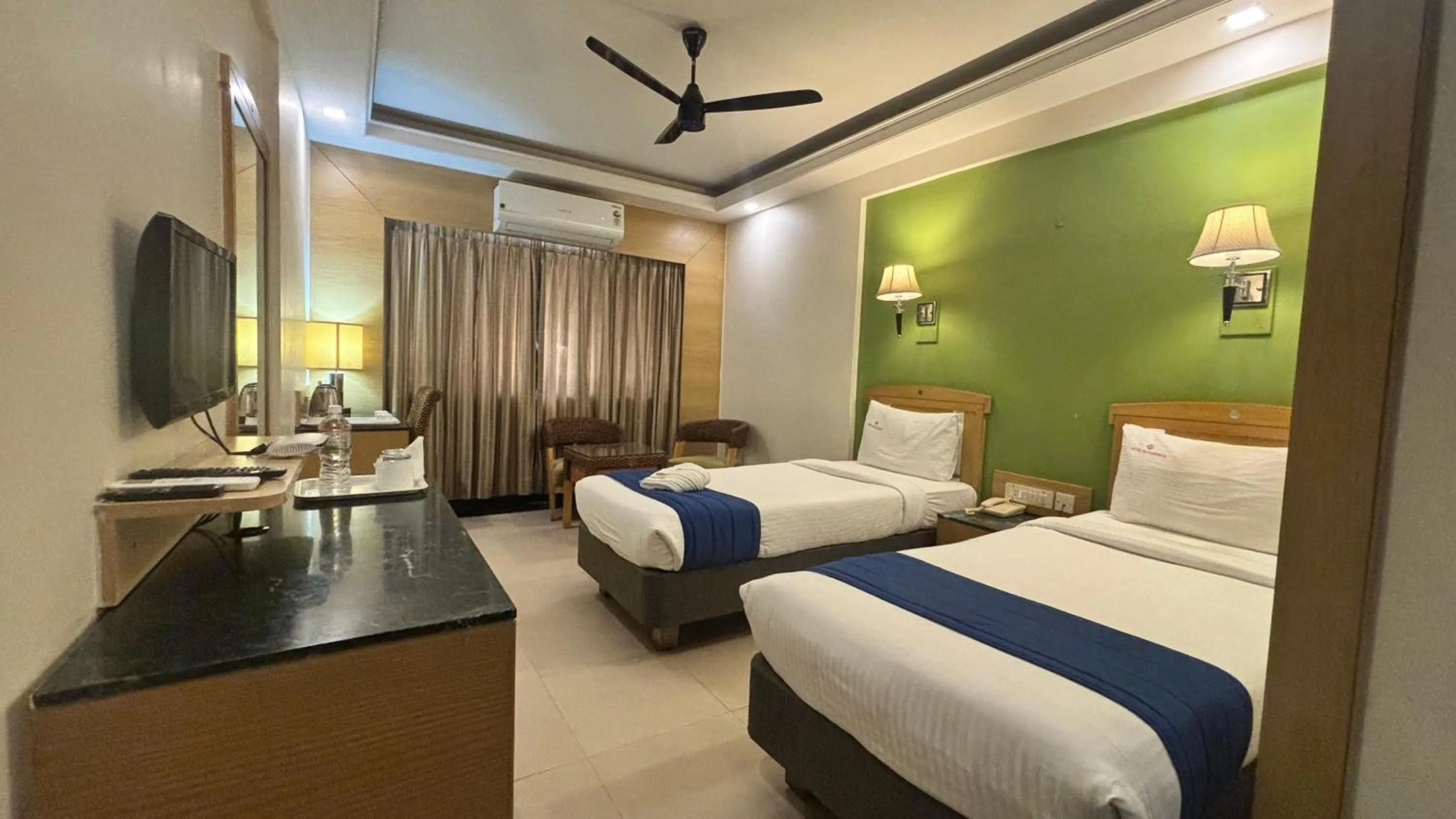 Bed in Hotel Dr Rajkumar International