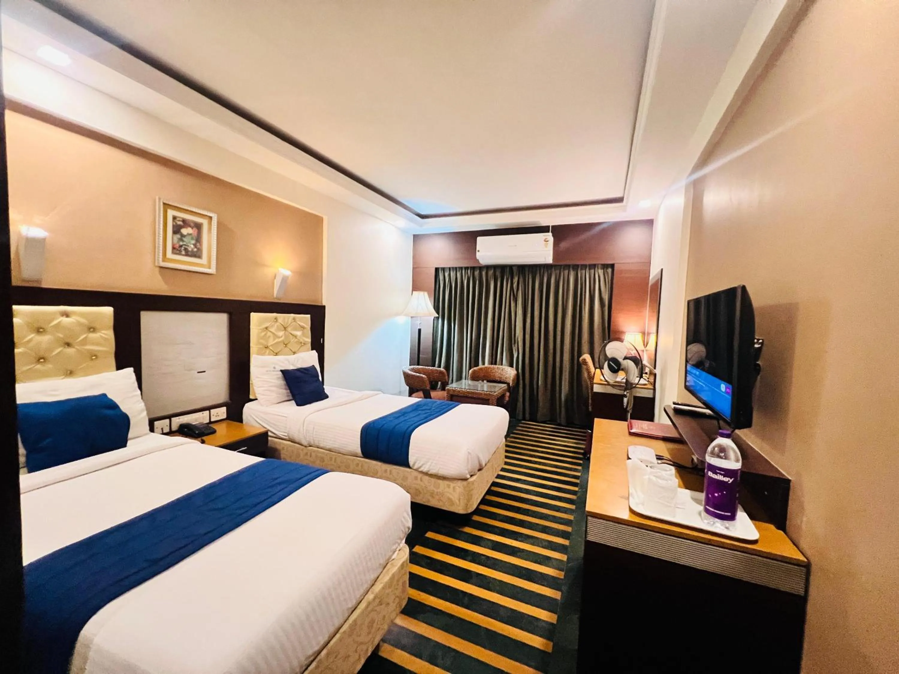 Bed in Hotel Dr Rajkumar International