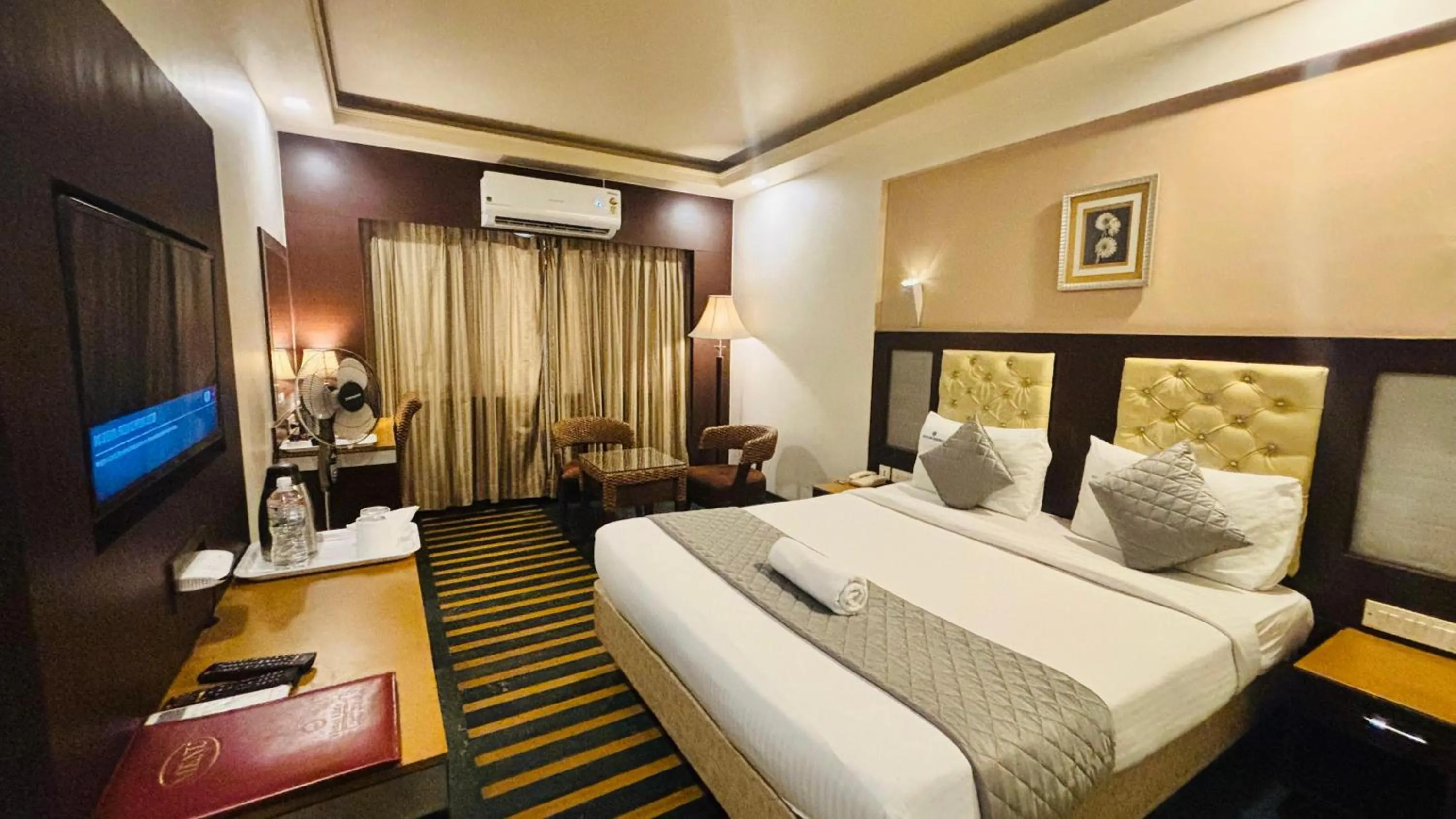 Bed in Hotel Dr Rajkumar International