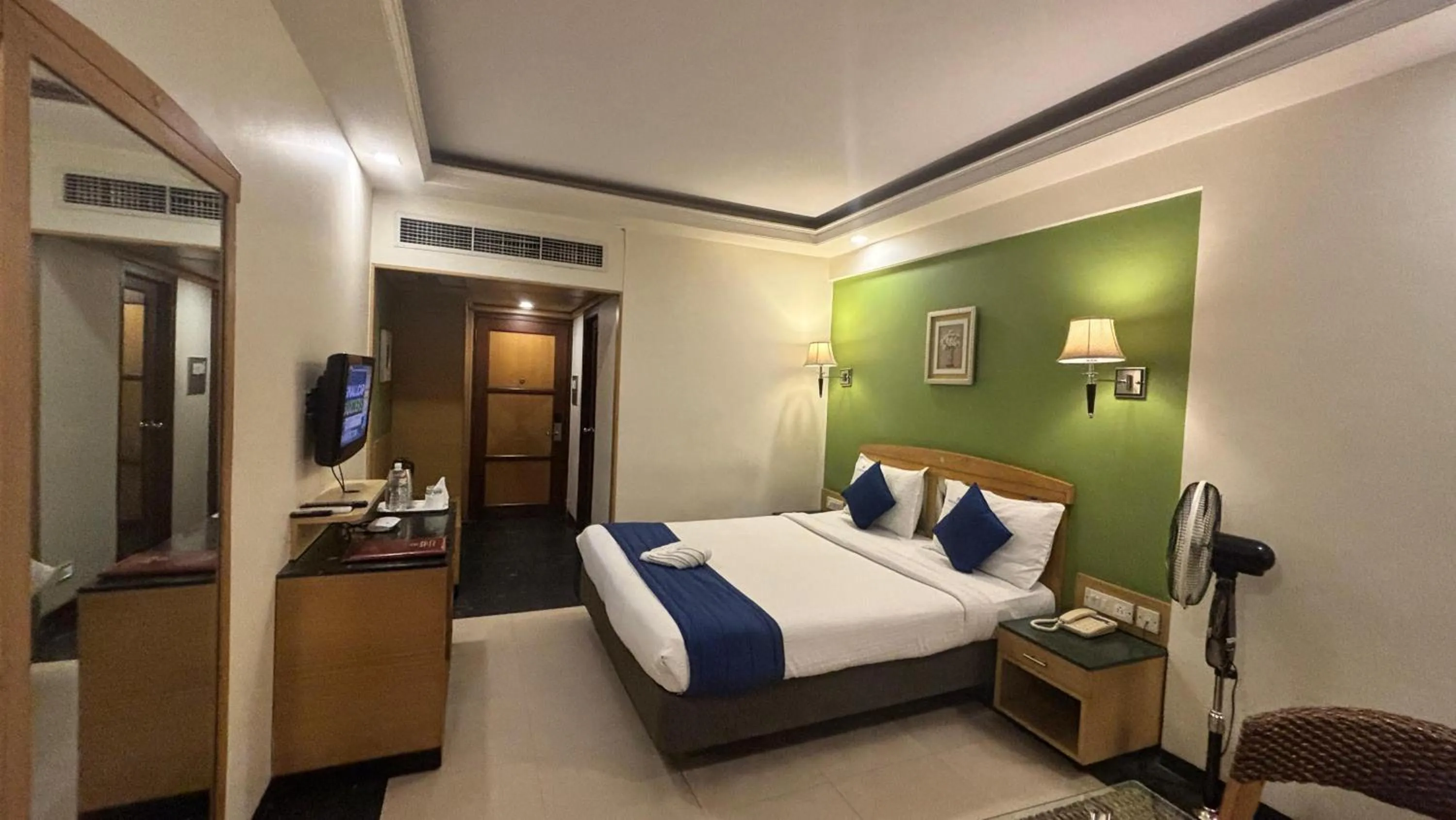 Bed in Hotel Dr Rajkumar International