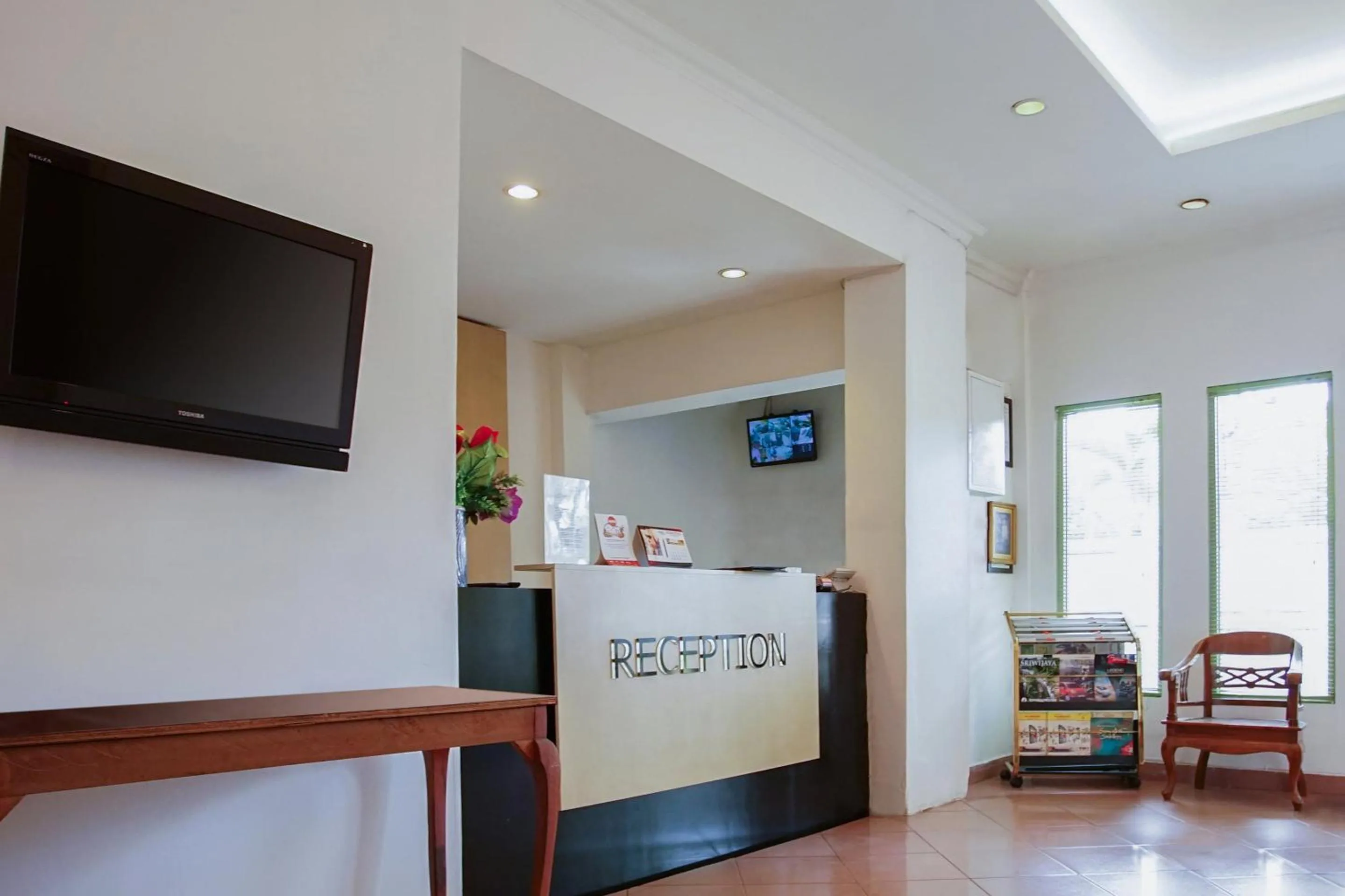 Lobby or reception in OYO 236 Penginapan Rumah Hijau