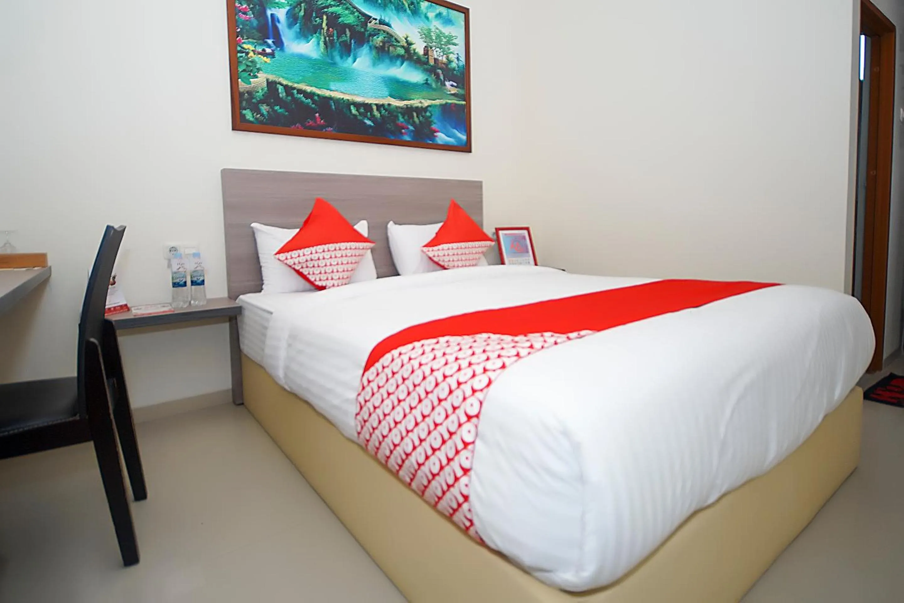 Bedroom in OYO 251 The Maximus Inn Hotel