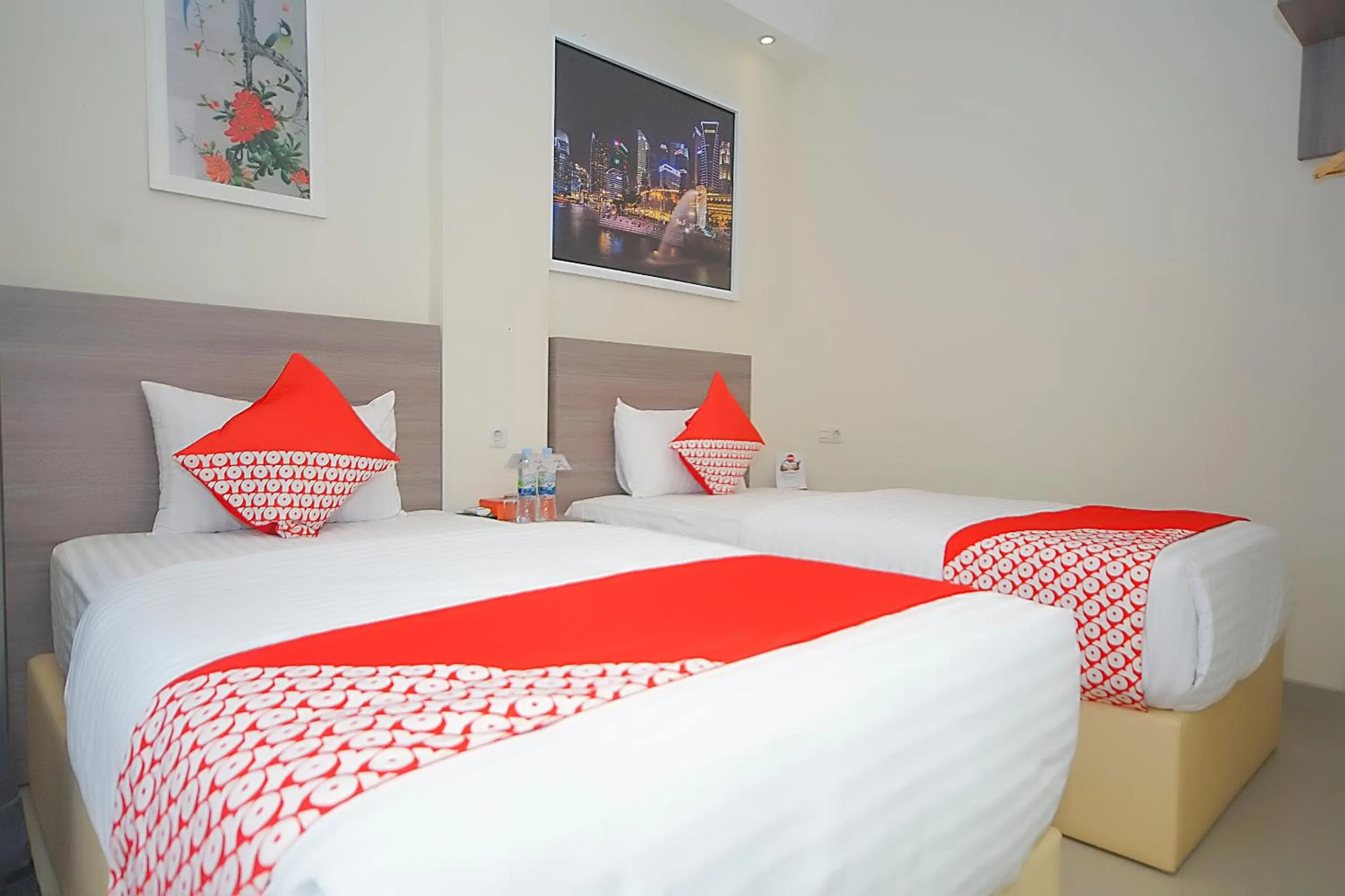 Bedroom in OYO 251 The Maximus Inn Hotel