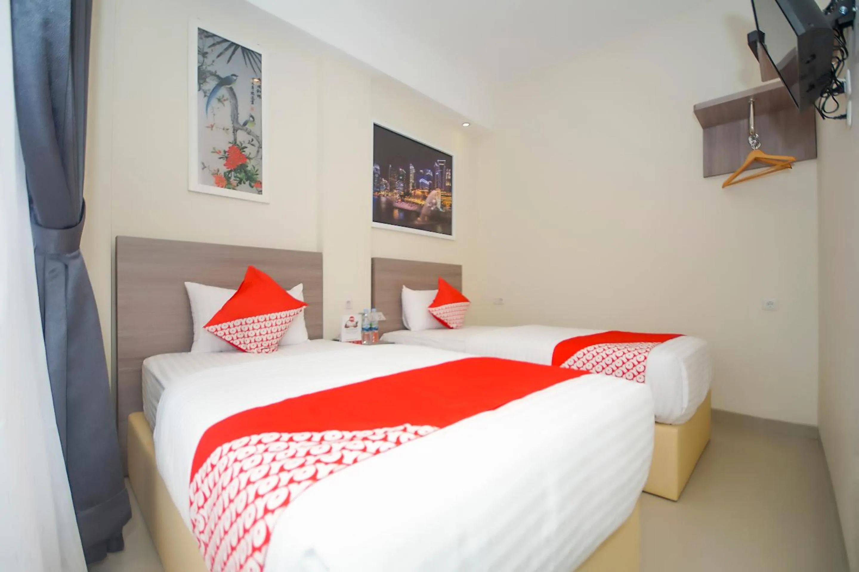 Bedroom in OYO 251 The Maximus Inn Hotel