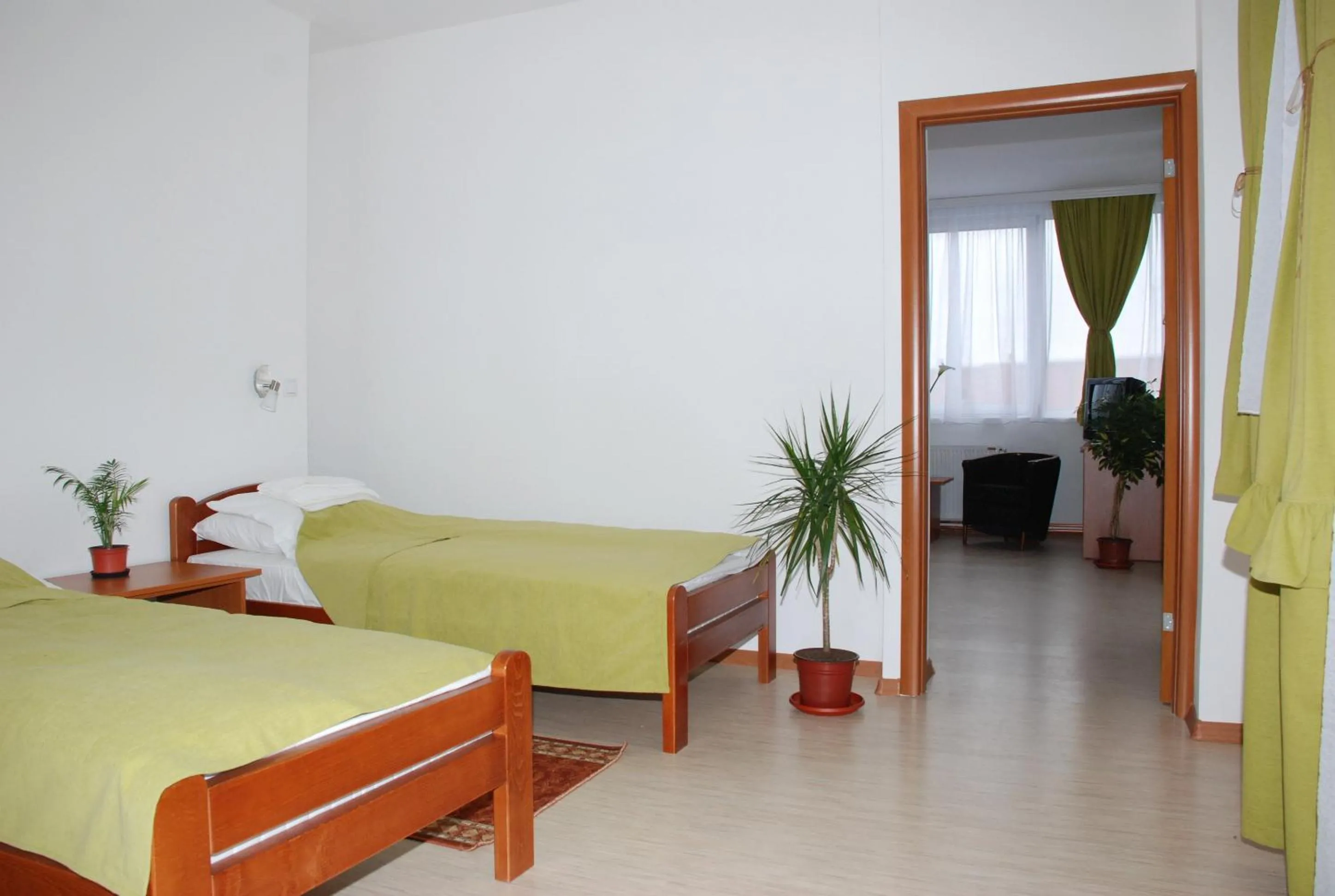 Bed in M Garni Hotel