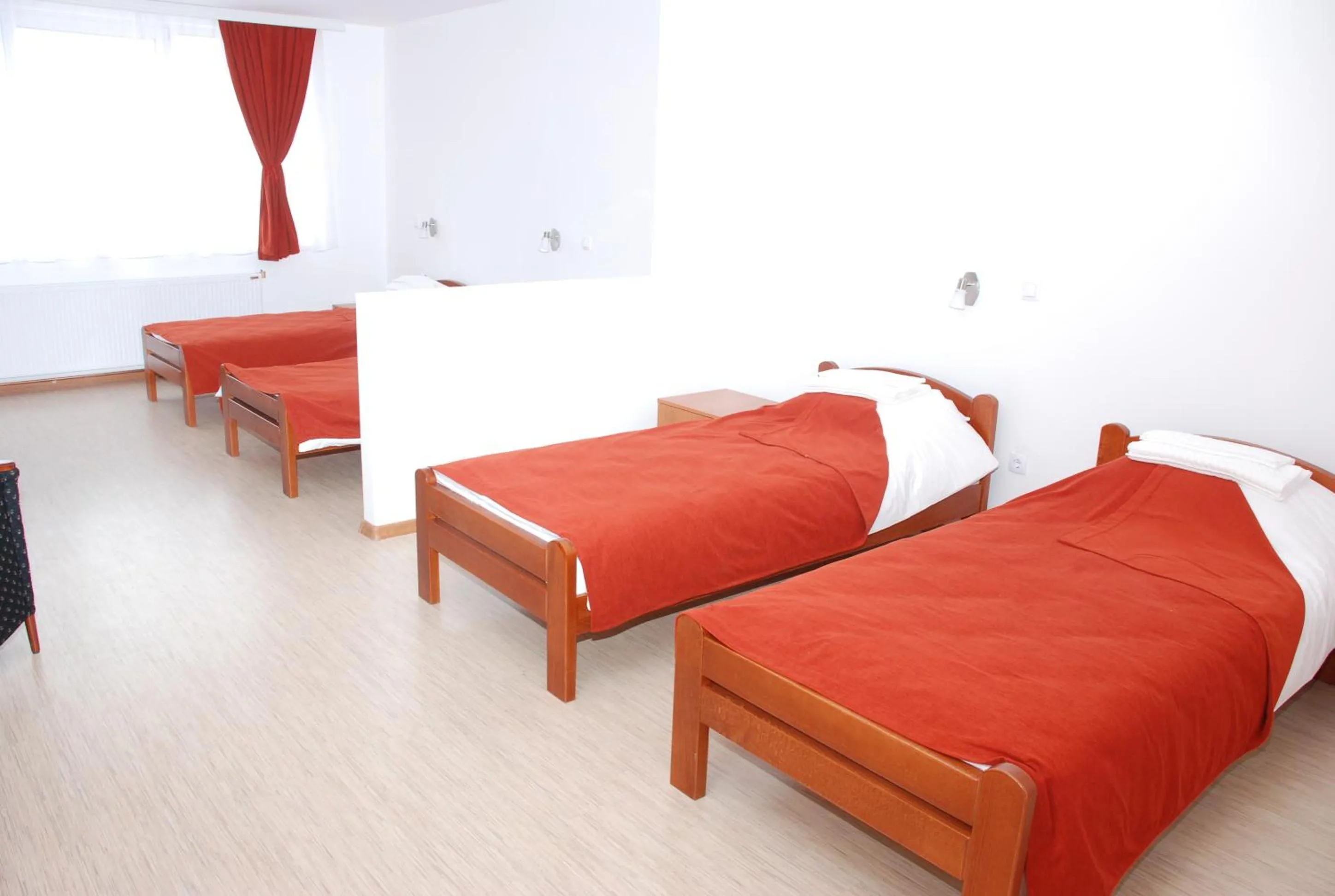 Bed in M Garni Hotel