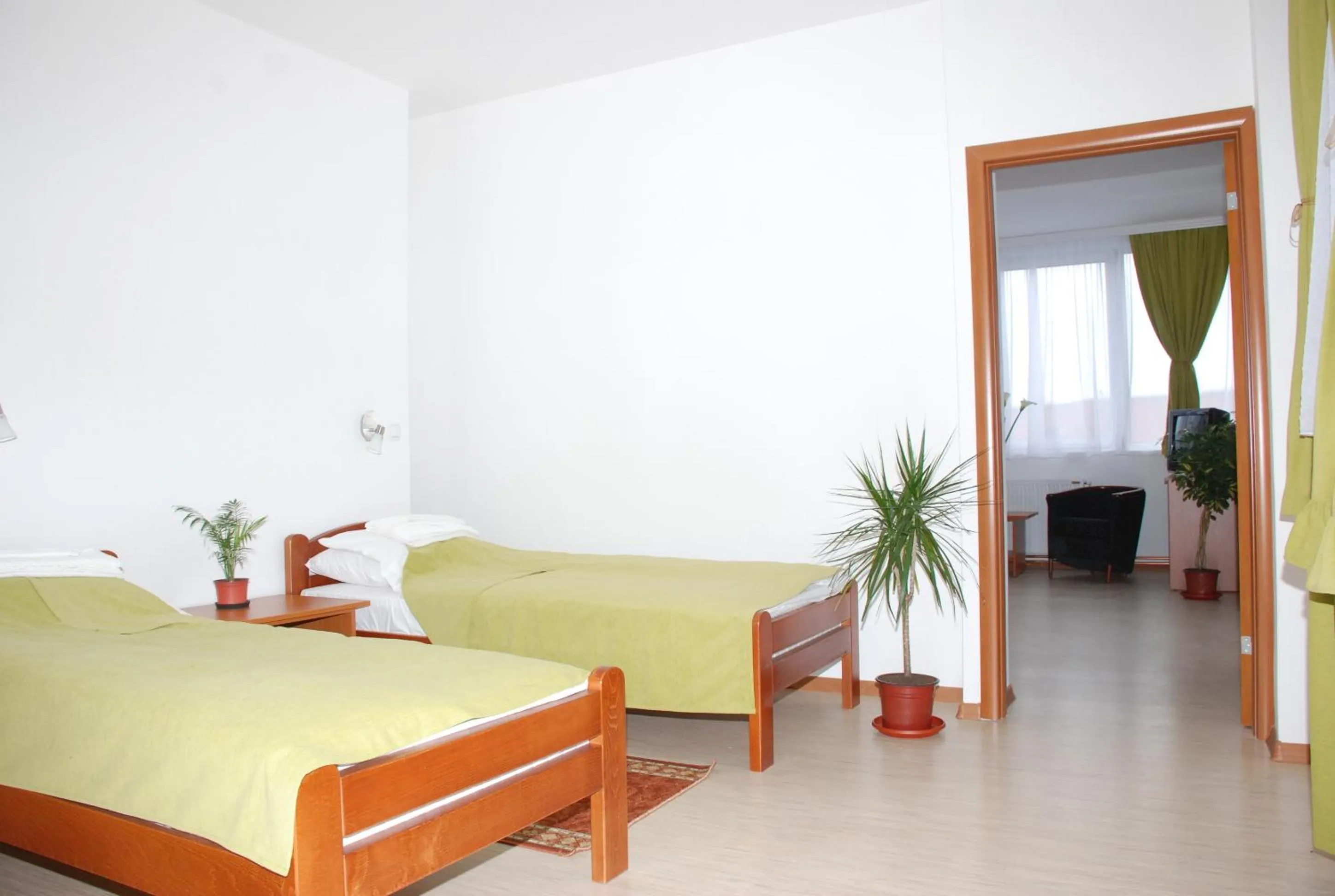 Bed in M Garni Hotel