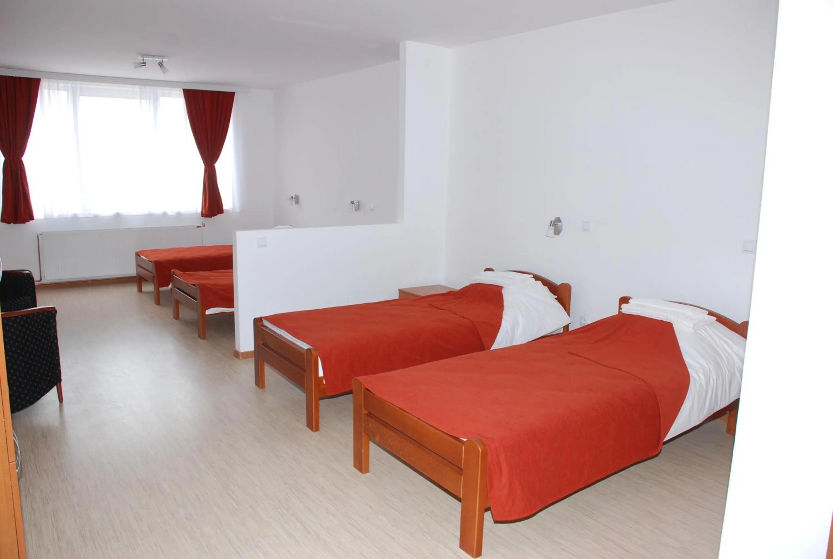 Bed in M Garni Hotel