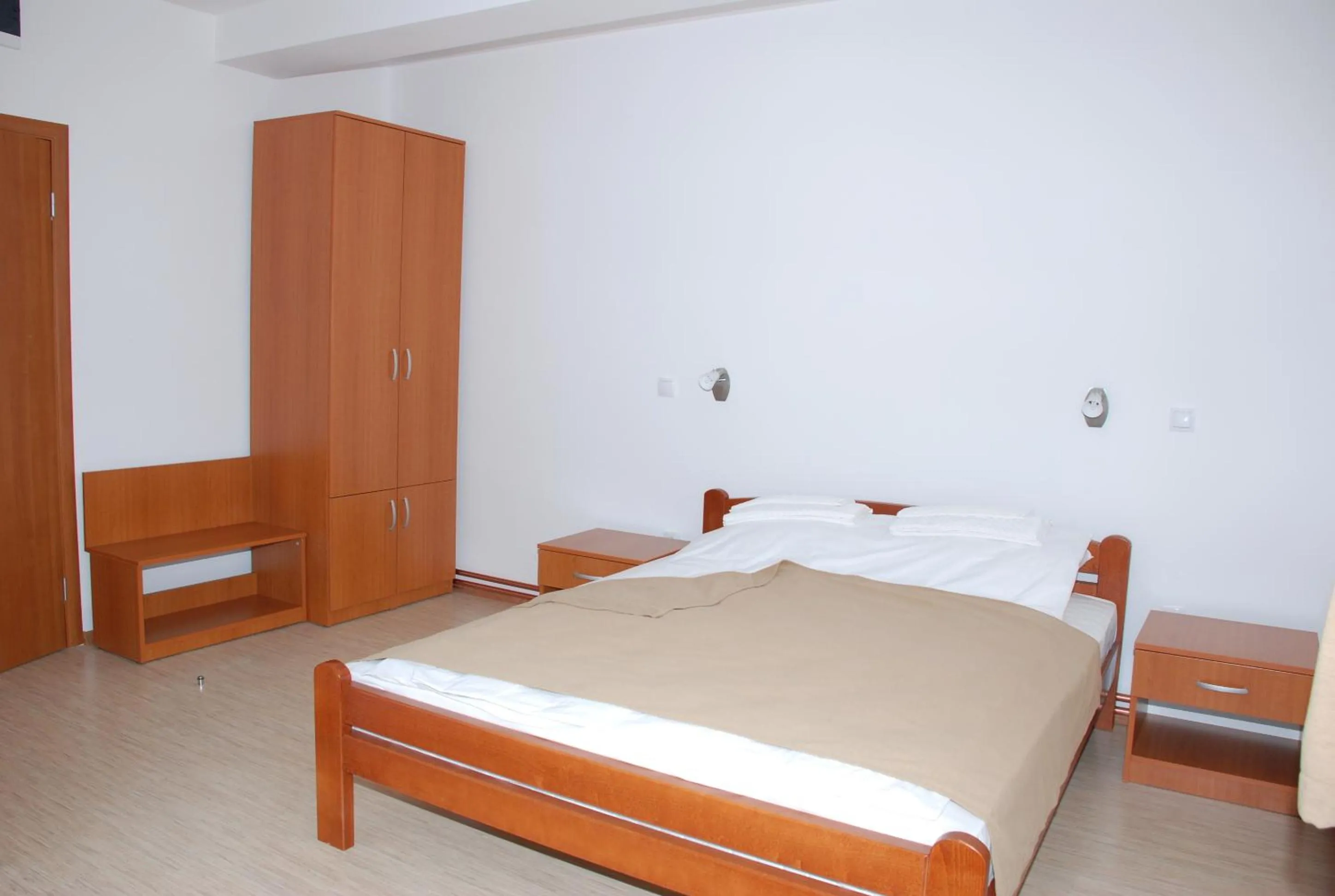 Bed in M Garni Hotel